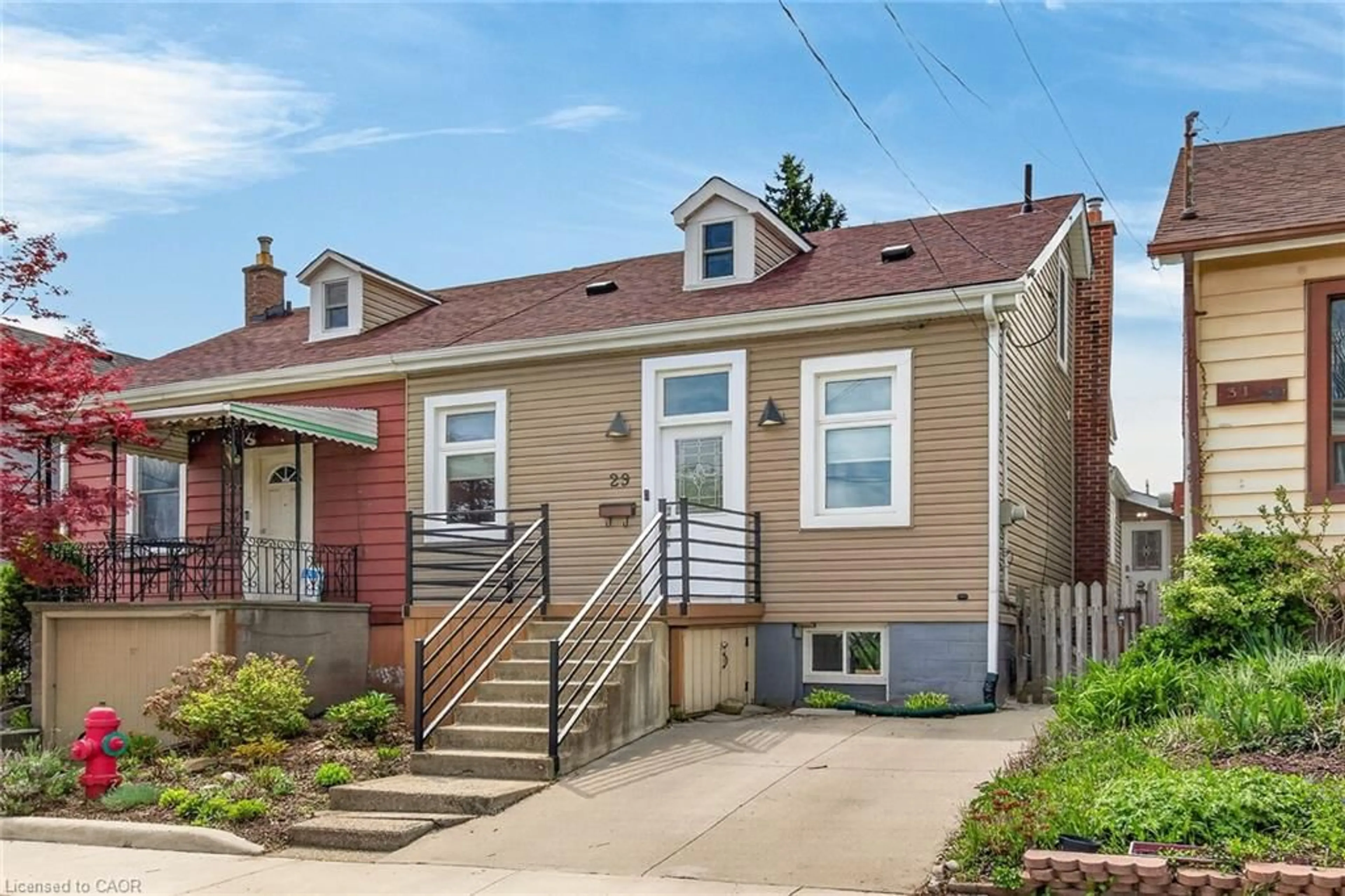 Home with vinyl exterior material, street for 29 Mill St, Hamilton Ontario L8R 2E2