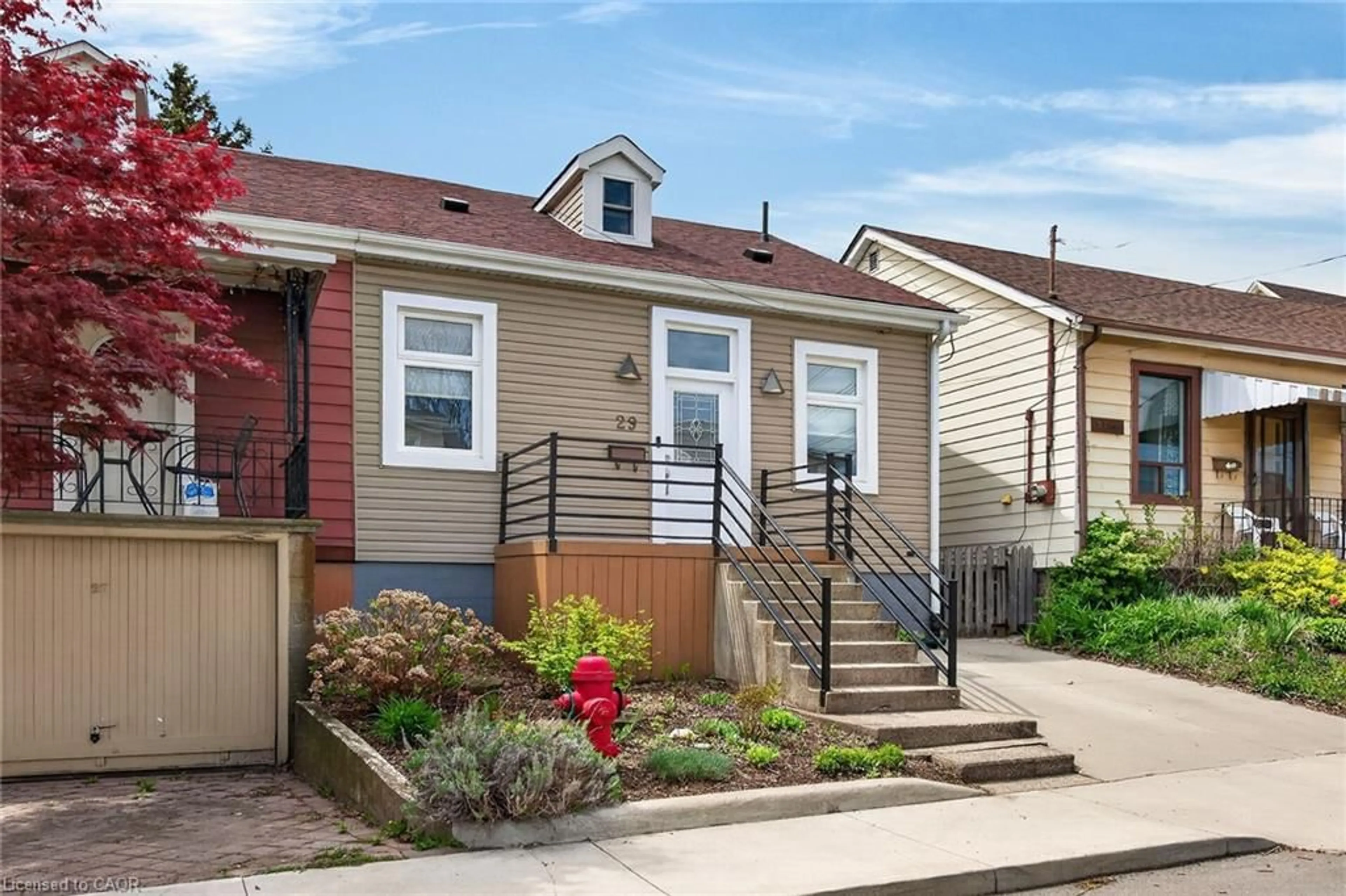 Home with vinyl exterior material, street for 29 Mill St, Hamilton Ontario L8R 2E2