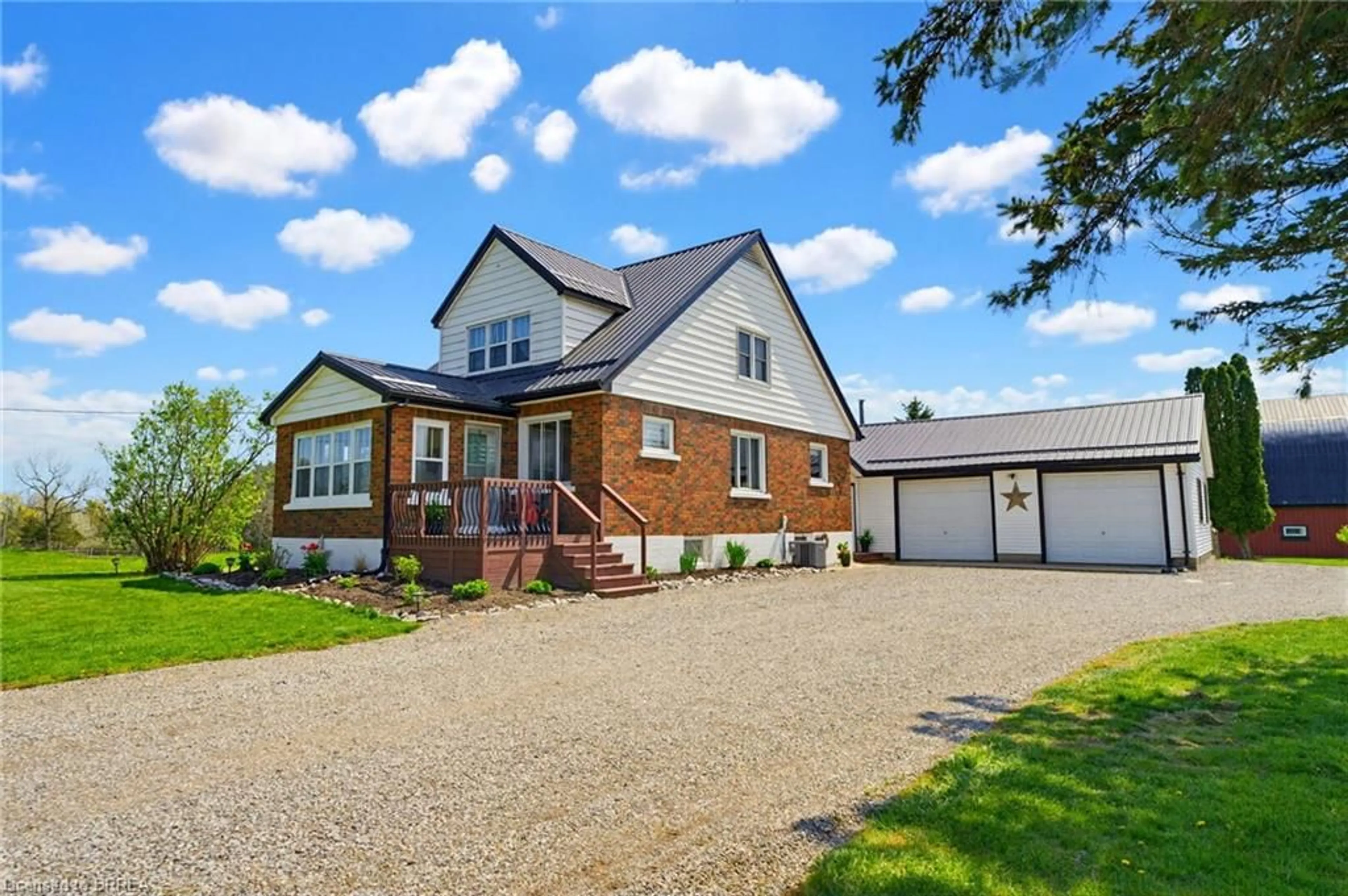 Home with brick exterior material, street for 84 Norfolk County Rd 57 Rd #RR#3, Simcoe Ontario N3Y 4K2