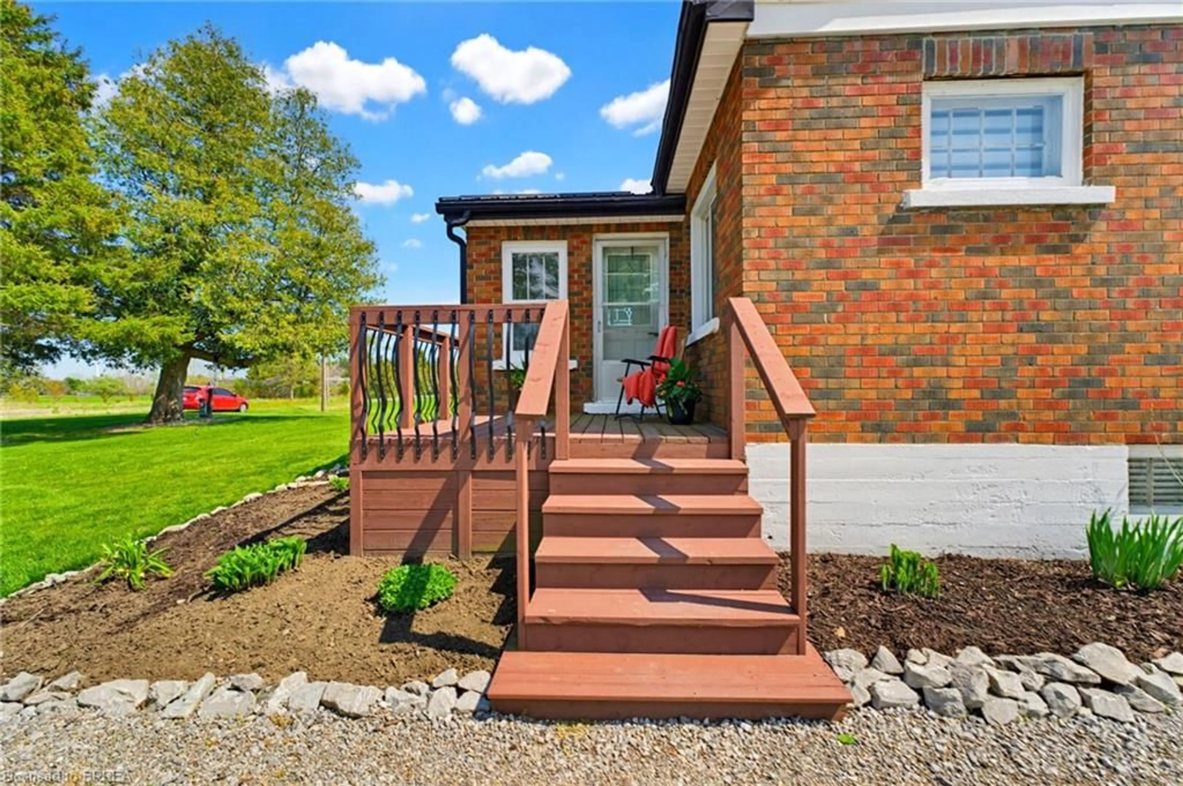 Home with brick exterior material, street for 84 Norfolk County Rd 57 Rd #RR#3, Simcoe Ontario N3Y 4K2