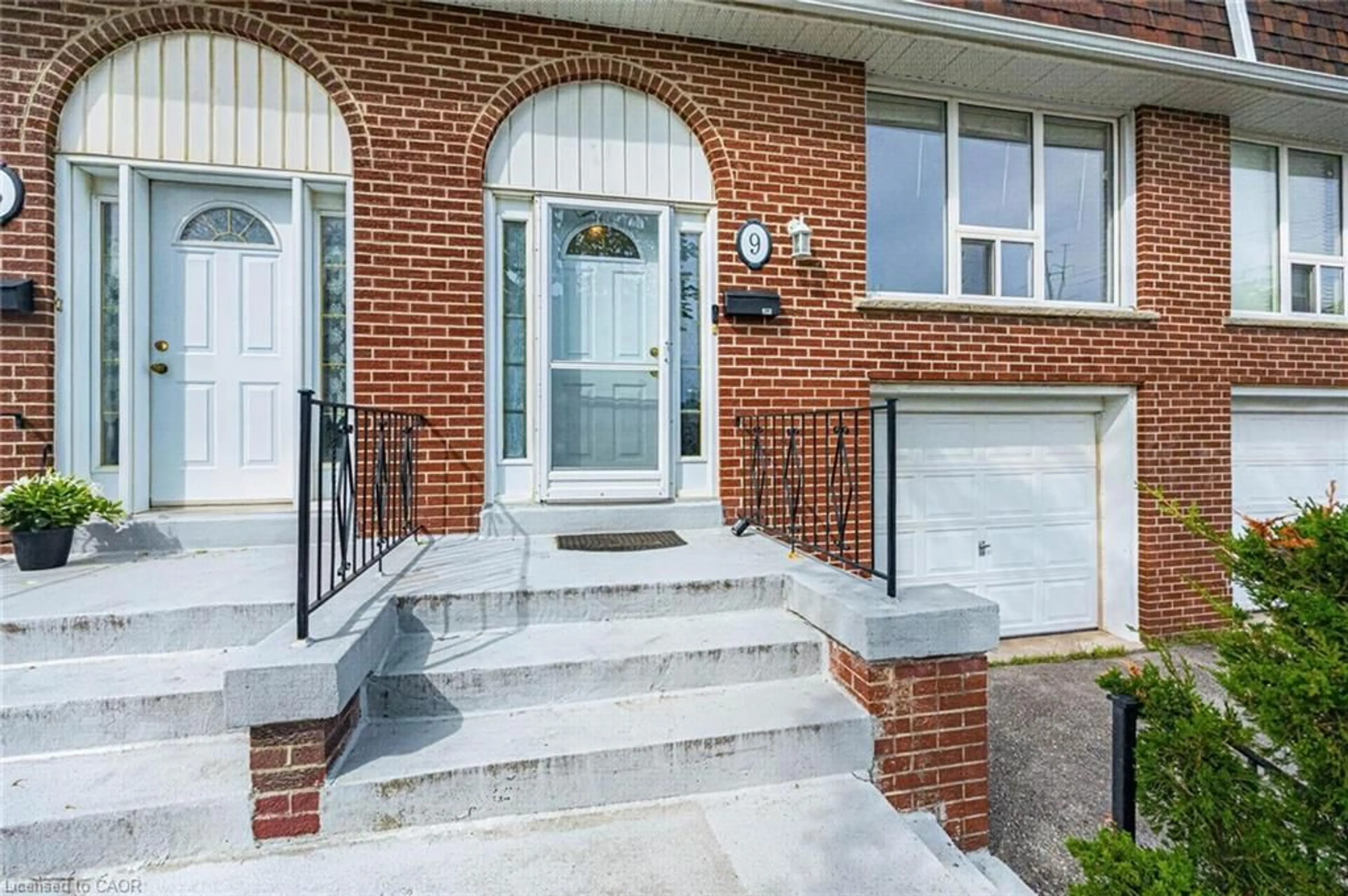 Home with brick exterior material, street for 2380 Bromsgrove Rd #9, Mississauga Ontario L5J 4E6