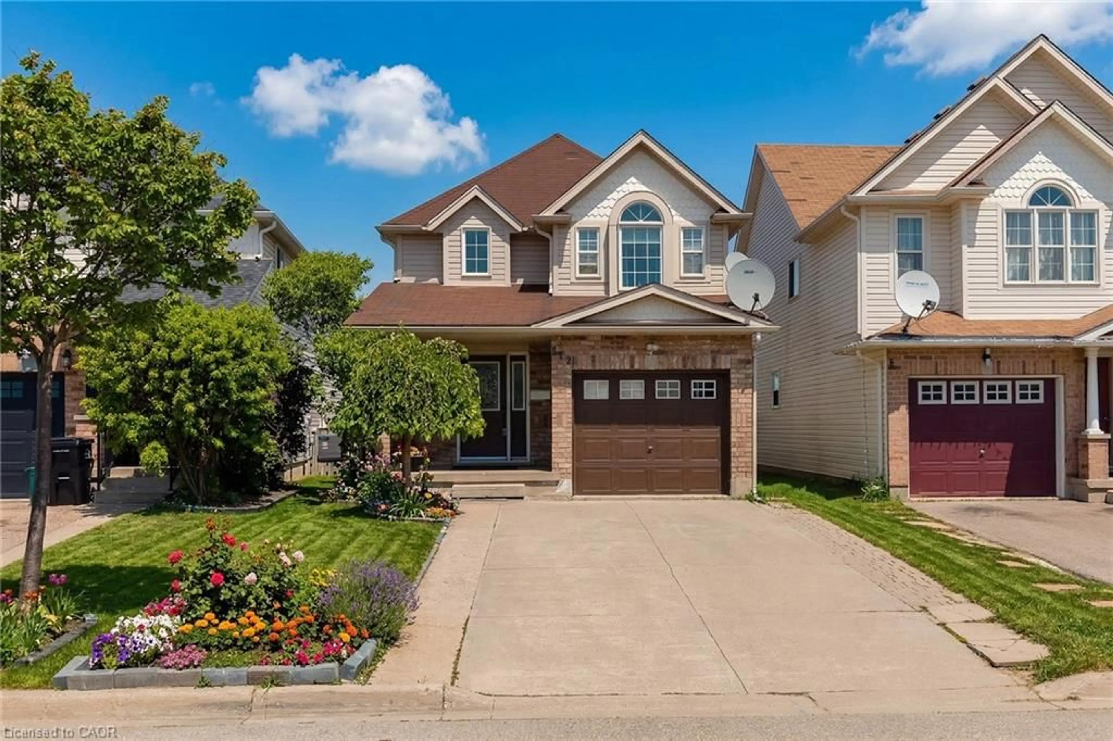 Home with brick exterior material, street for 512 Snowdrop Crt, Kitchener Ontario N2E 4G4