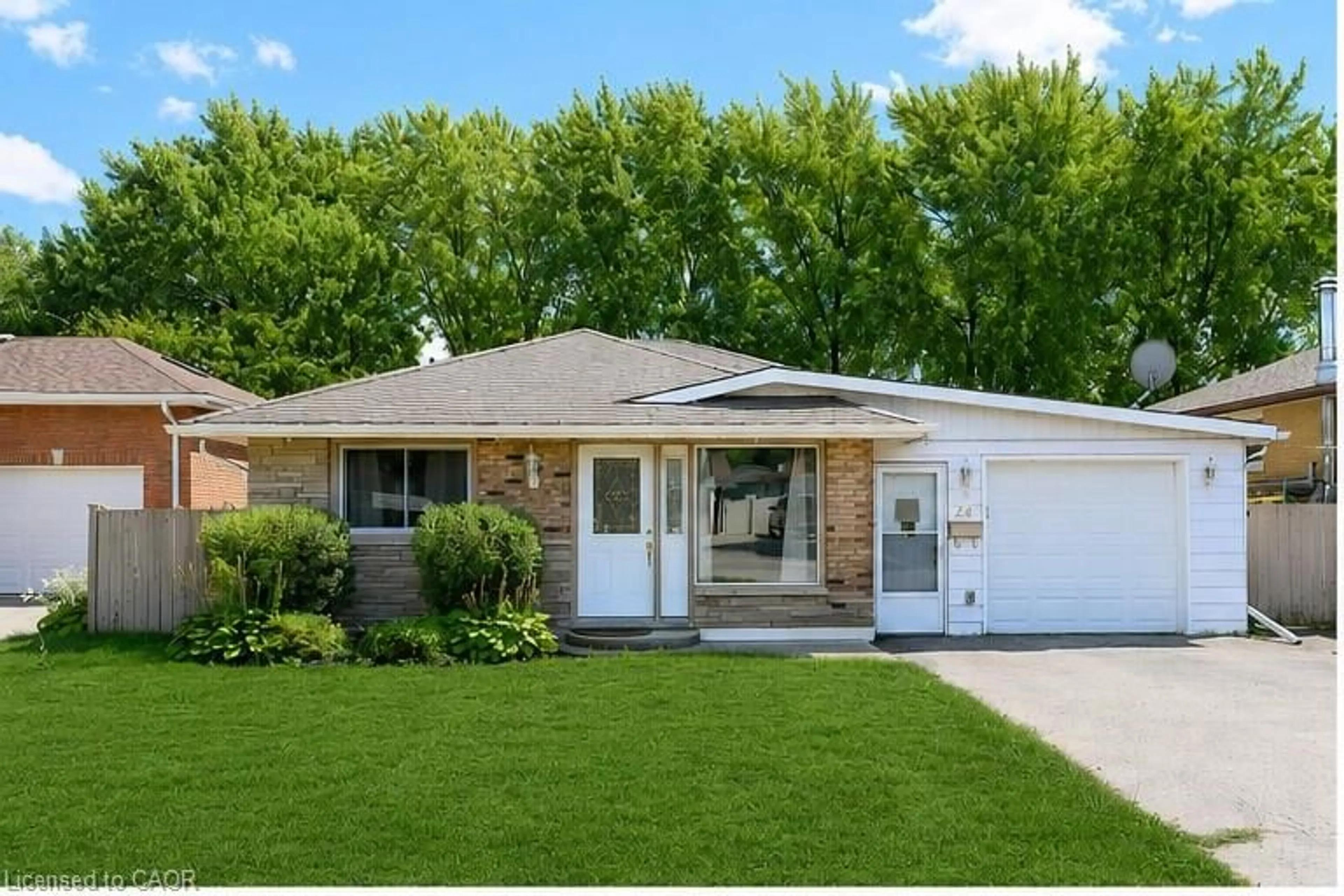 Home with vinyl exterior material, street for 24 Oxford St, Brantford Ontario N3R 5C6