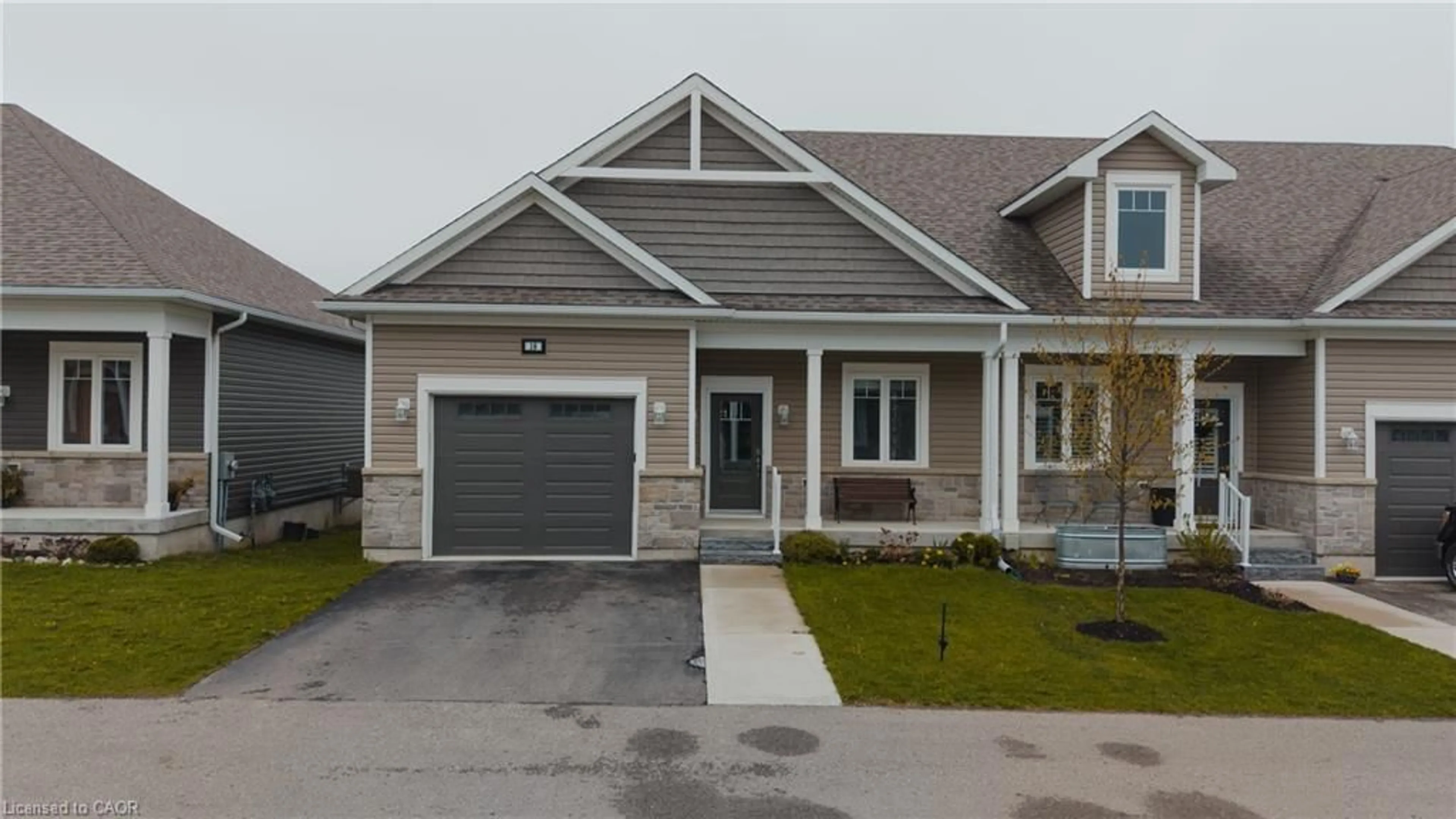 Home with vinyl exterior material, street for 24 George St #18, Harriston Ontario N0G 1Z0