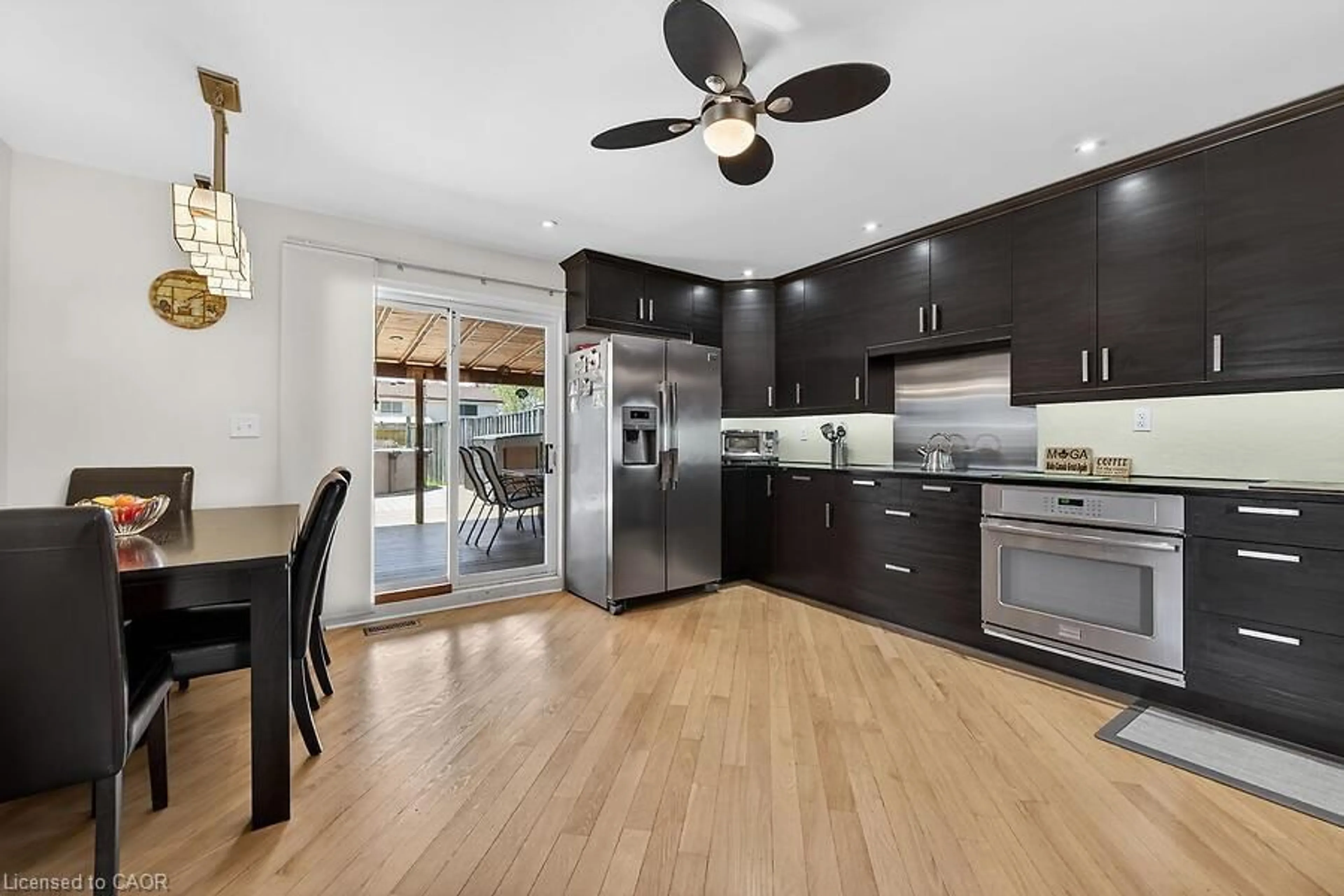 Open concept kitchen, wood/laminate floor for 254 St Andrews Dr, Hamilton Ontario L8K 5K3