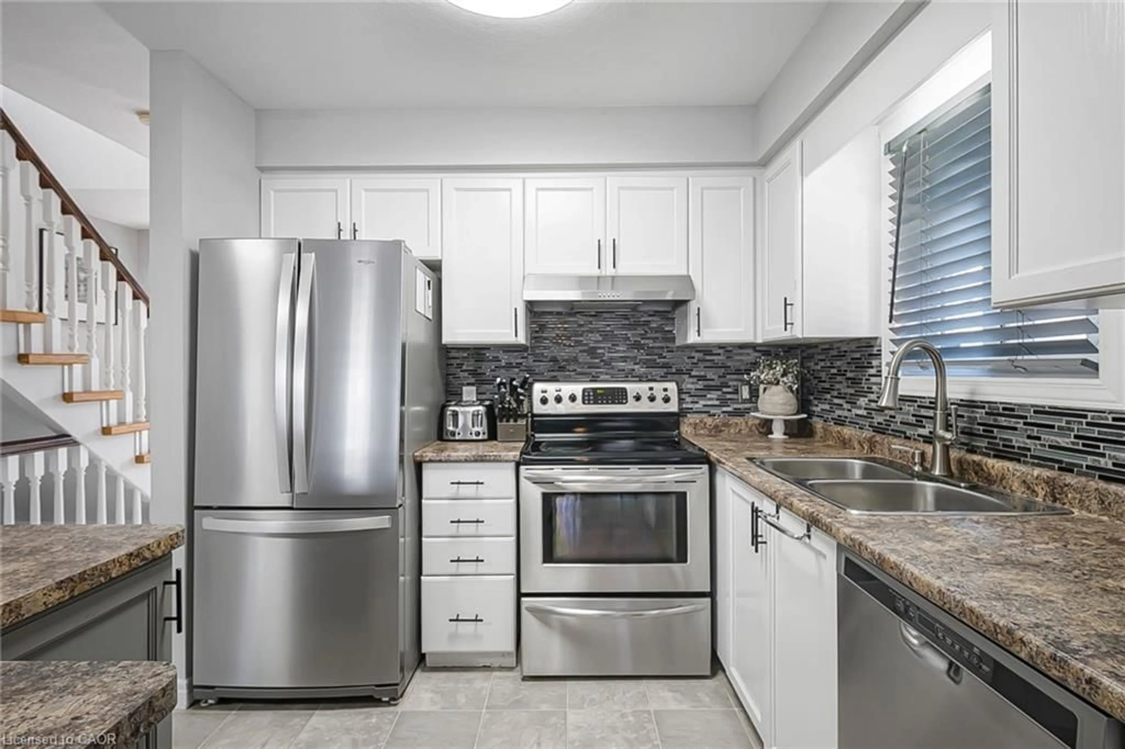 Standard kitchen, ceramic/tile floor for 18 Mountain Mint Cres, Kitchener Ontario N2E 3R4
