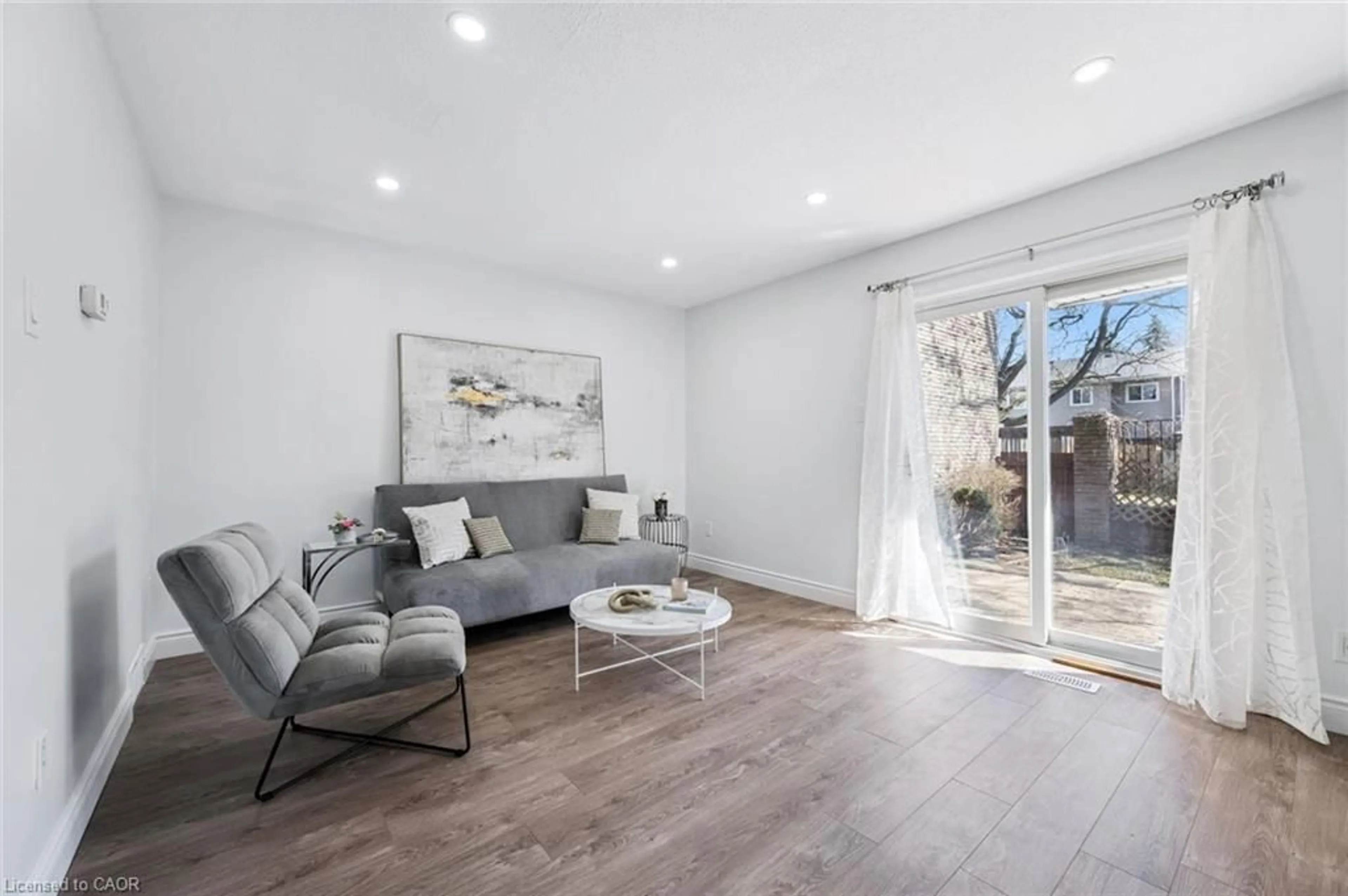 Living room with furniture, wood/laminate floor for 224G Harvard Pl, Waterloo Ontario N2J 4G2