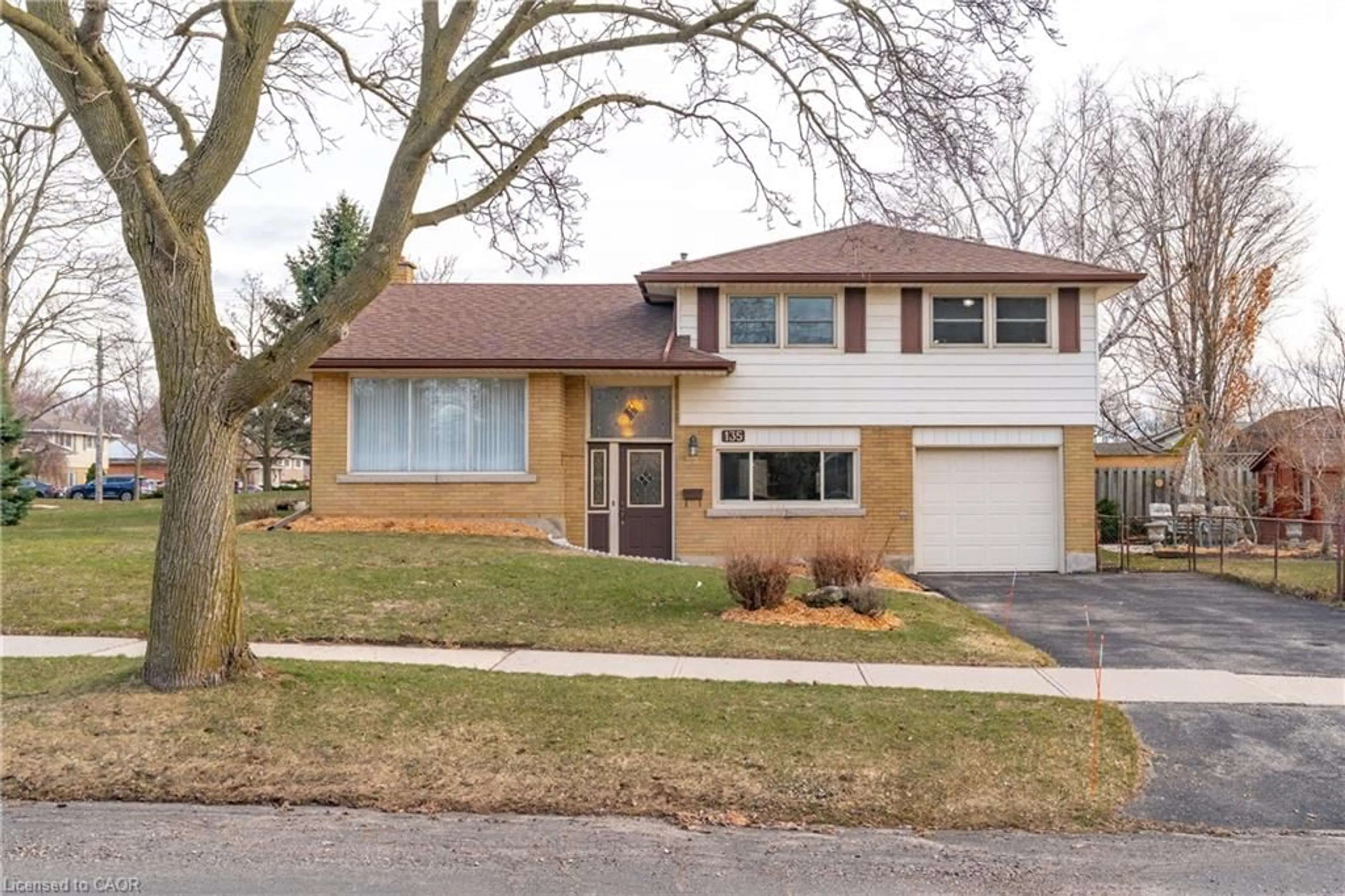Home with brick exterior material, street for 135 Burbank Rd, Kitchener Ontario N2B 1E3
