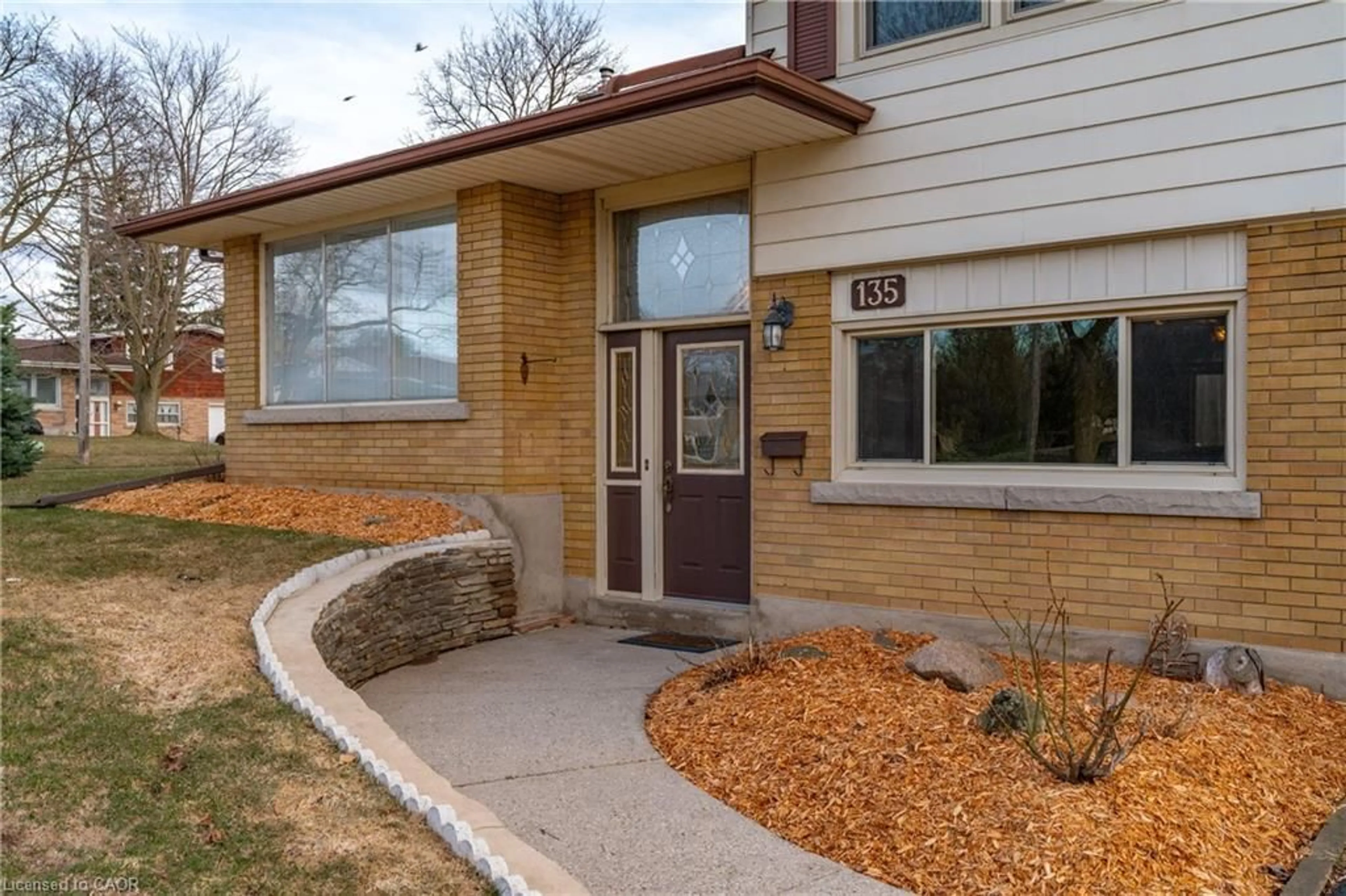 Home with brick exterior material, street for 135 Burbank Rd, Kitchener Ontario N2B 1E3