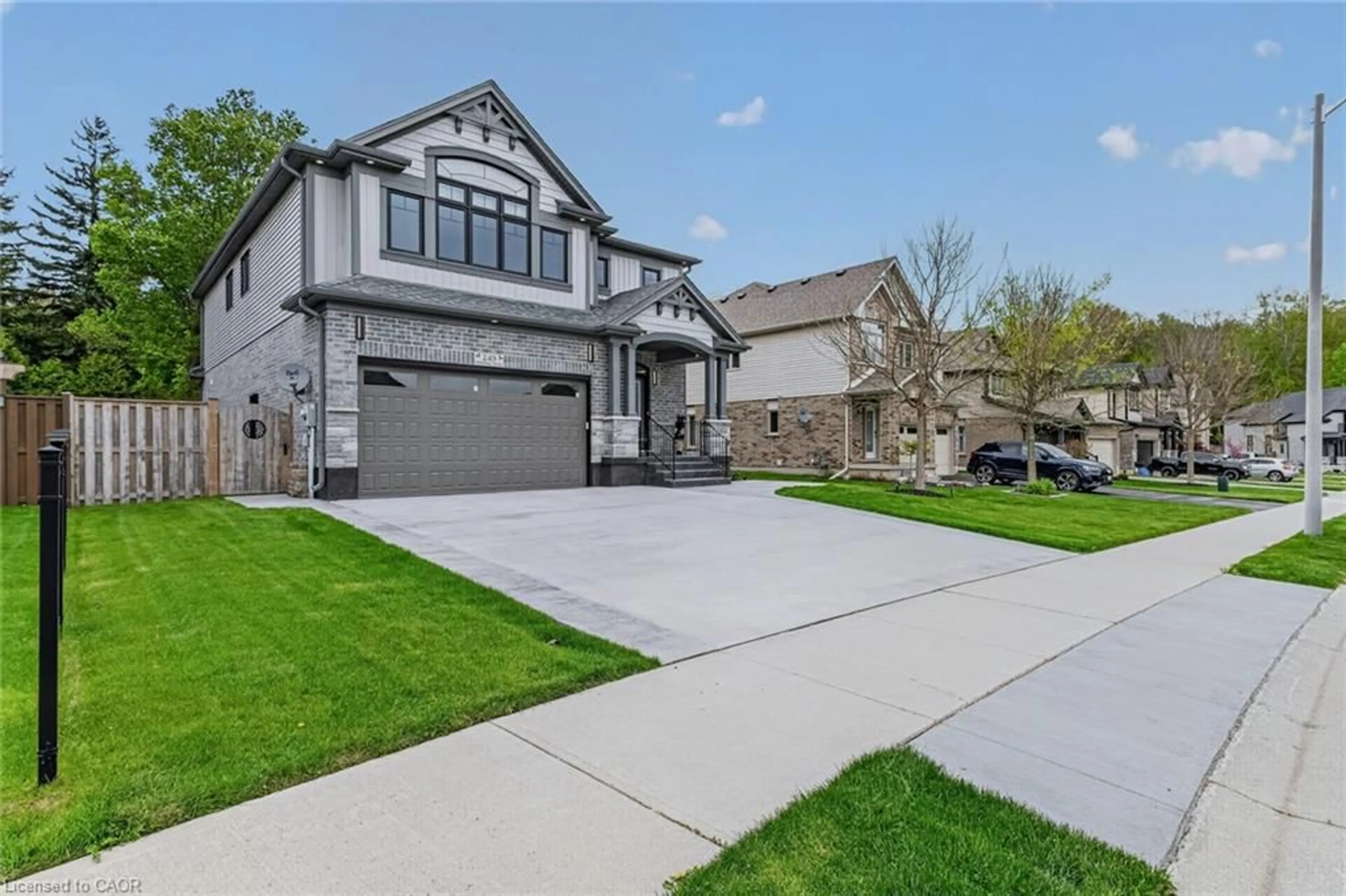 Home with brick exterior material, street for 249 Woodway Trail, Simcoe Ontario N3Y 0C7
