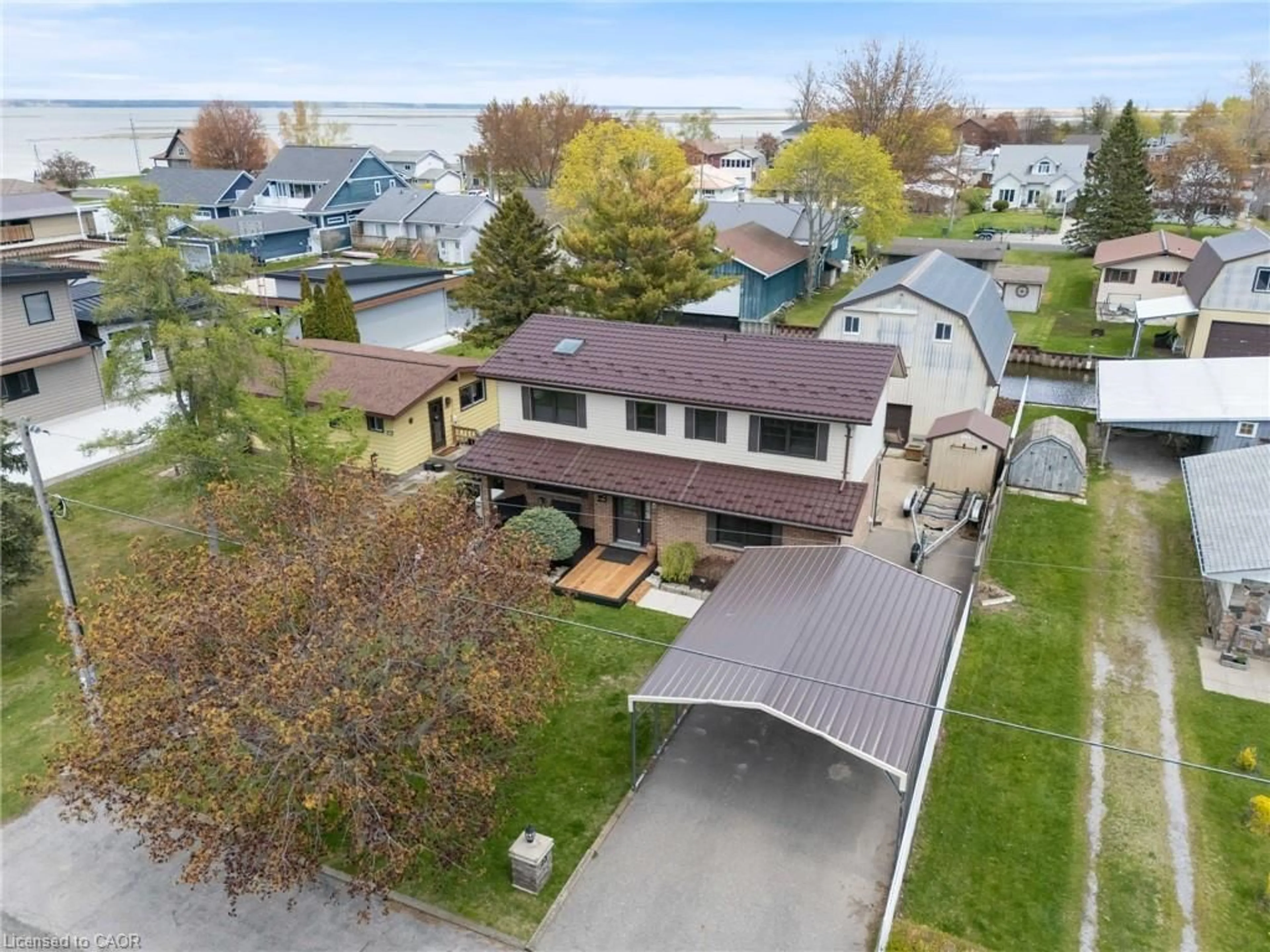 A pic from outside/outdoor area/front of a property/back of a property/a pic from drone, street for 23 Poplar Rd, Long Point Ontario N0E 1M0