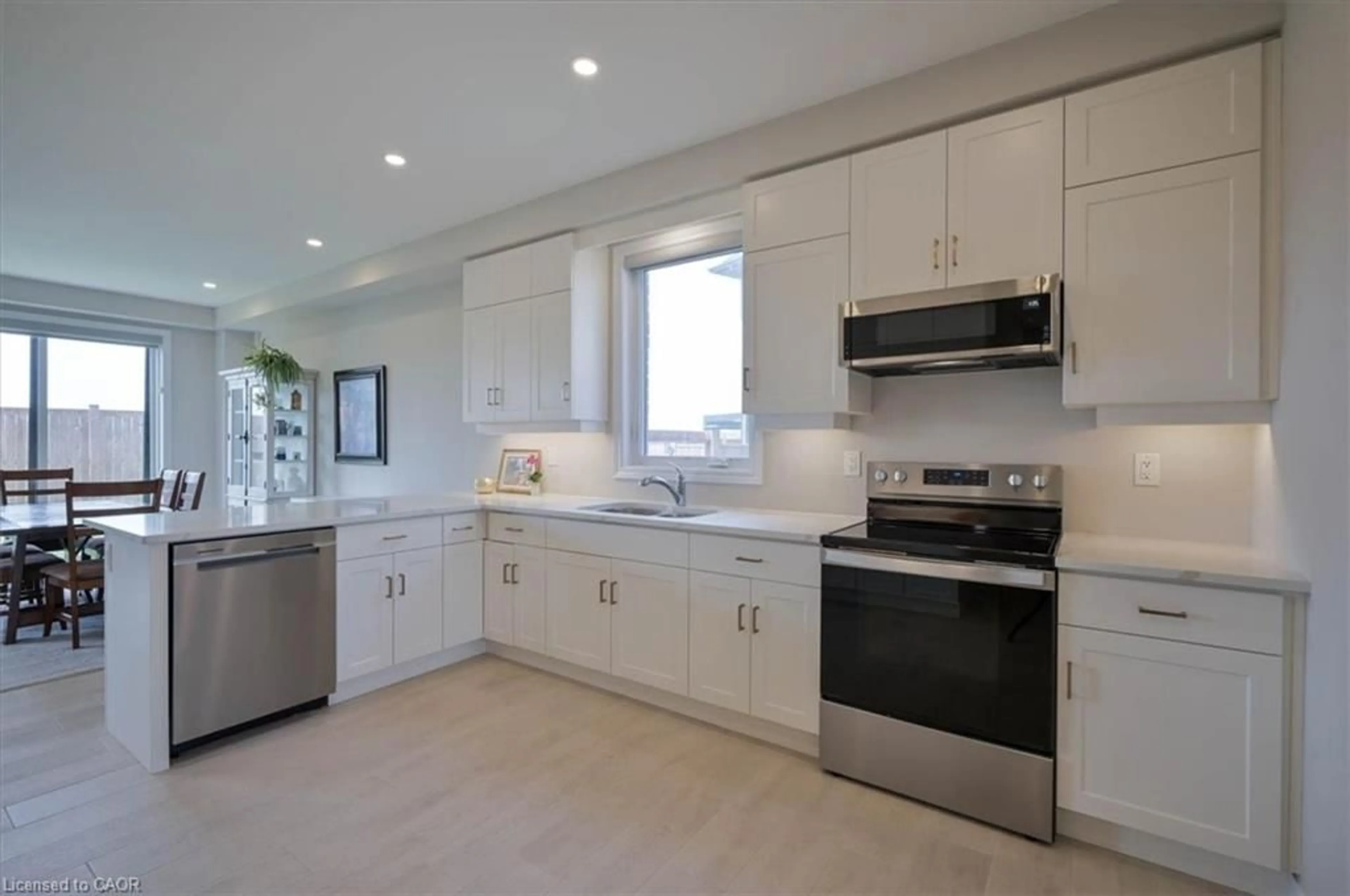 Open concept kitchen, ceramic/tile floor for 107 Snyder Ave, Elmira Ontario N3B 0E1