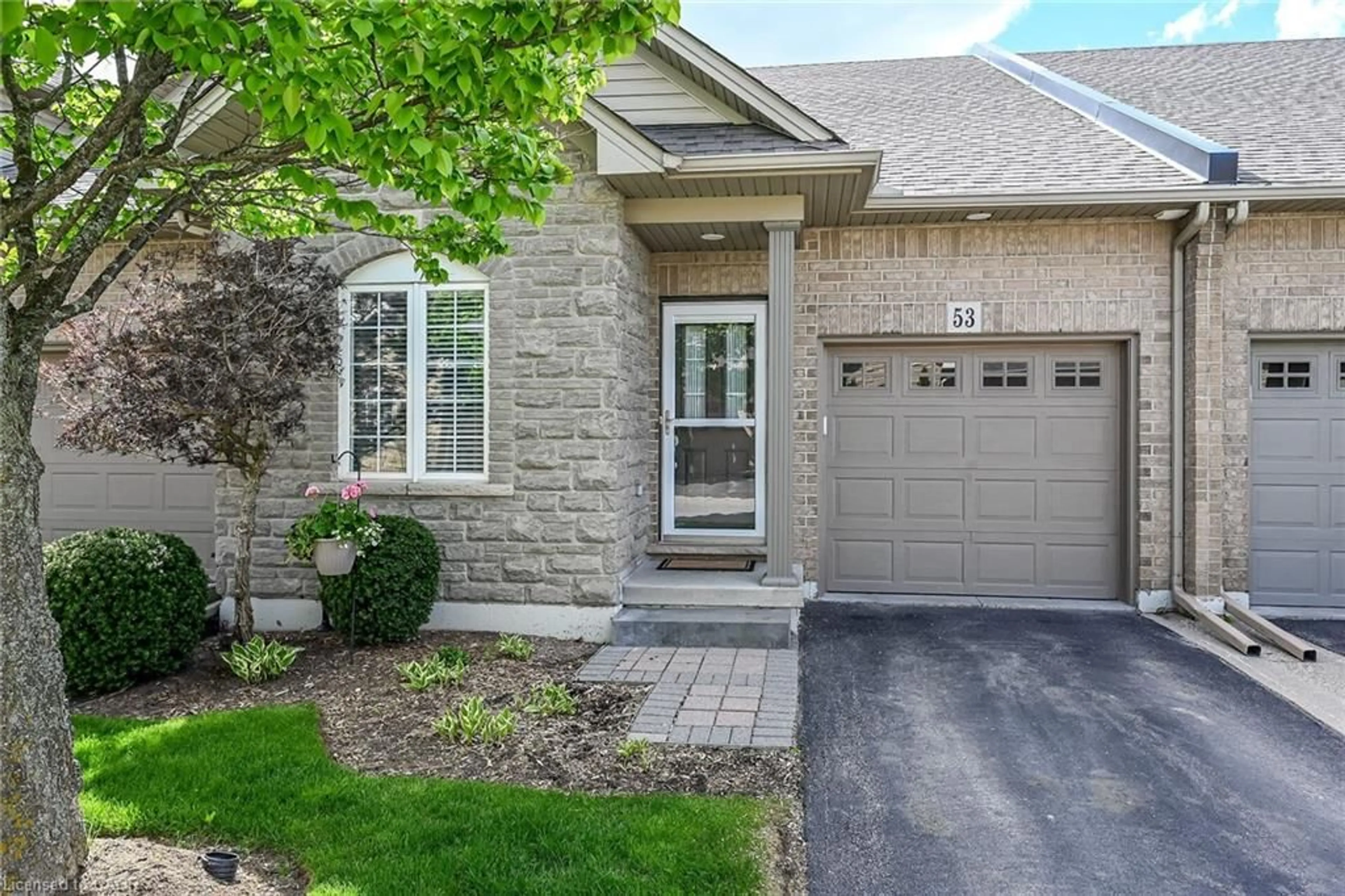 Home with brick exterior material, street for 53 Hallmark Trail, Hamilton Ontario L9B 0B8