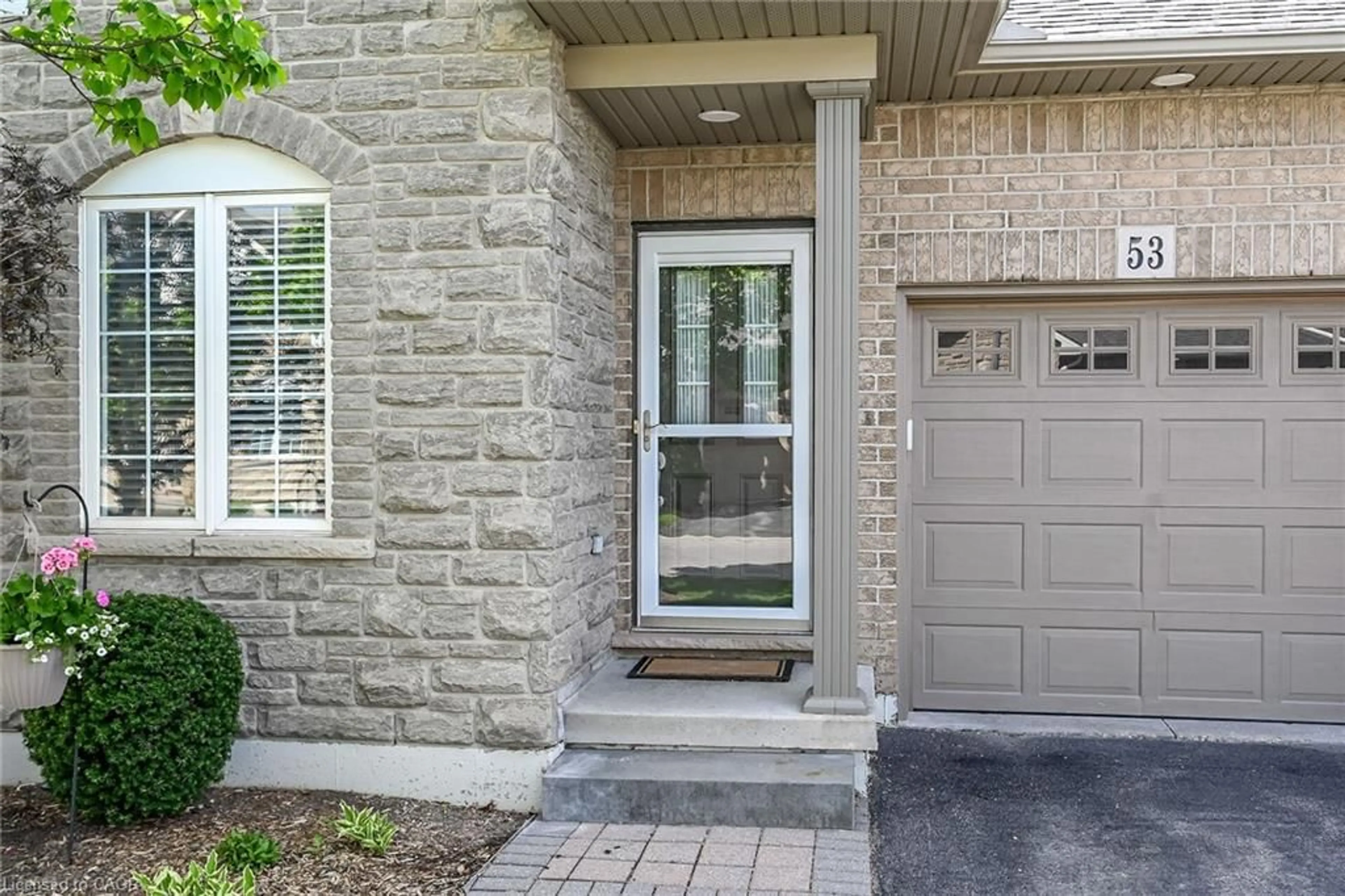 Home with brick exterior material, street for 53 Hallmark Trail, Hamilton Ontario L9B 0B8