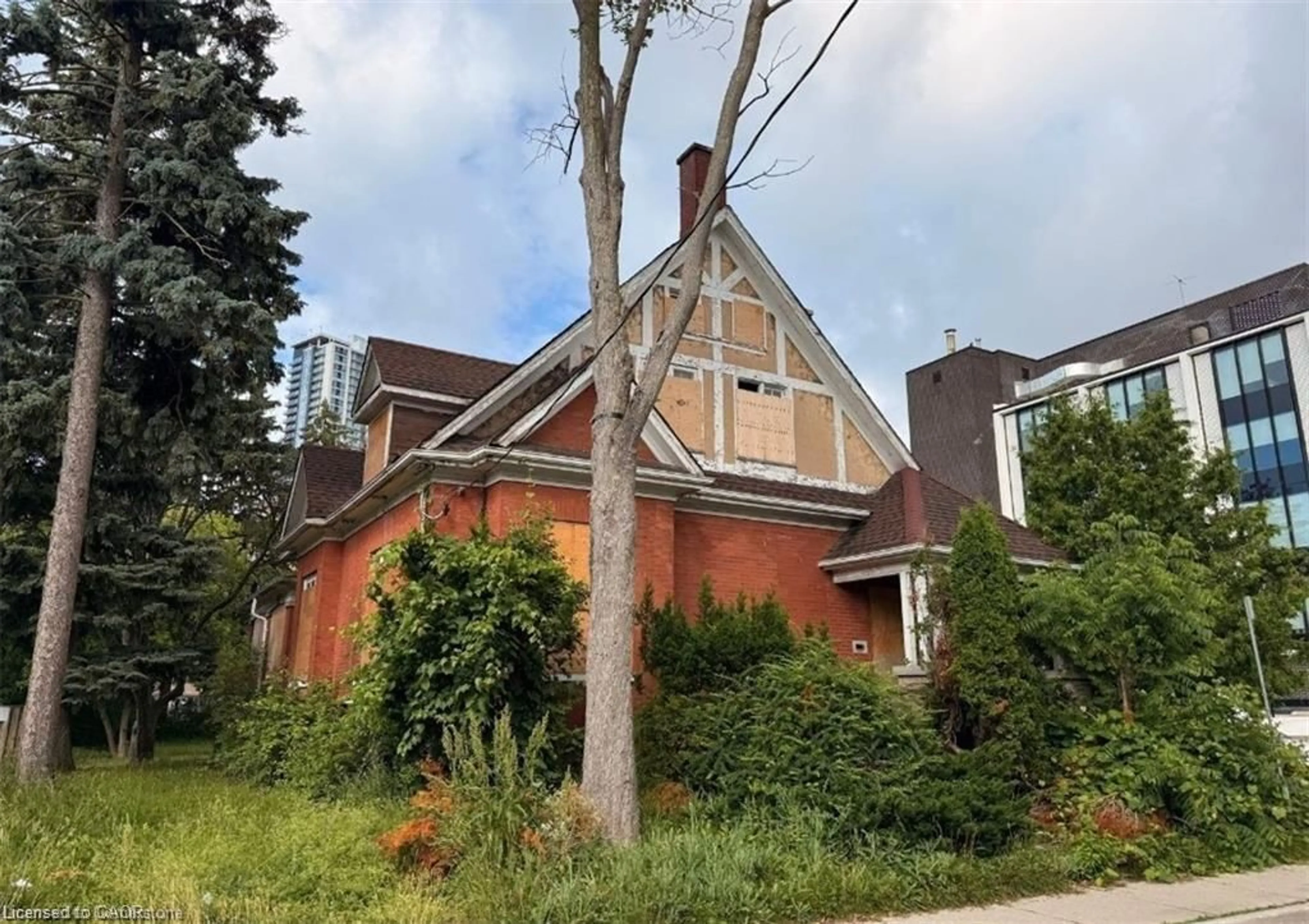 Home with brick exterior material, street for 11 Irvin St, Kitchener Ontario N2H 1K6