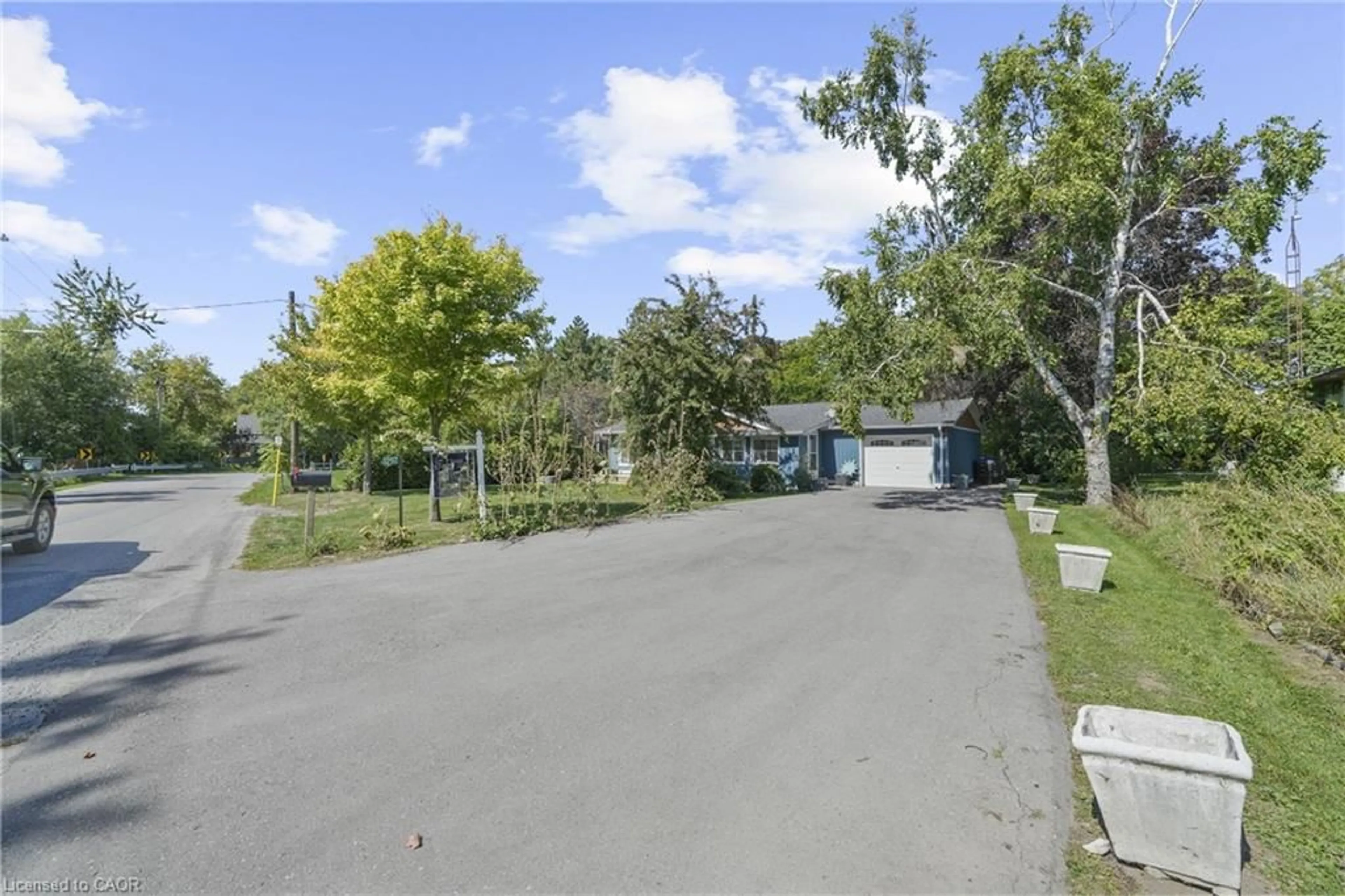 A pic from outside/outdoor area/front of a property/back of a property/a pic from drone, street for 1297 Ramara Road 47, Ramara Ontario L0K 1B0