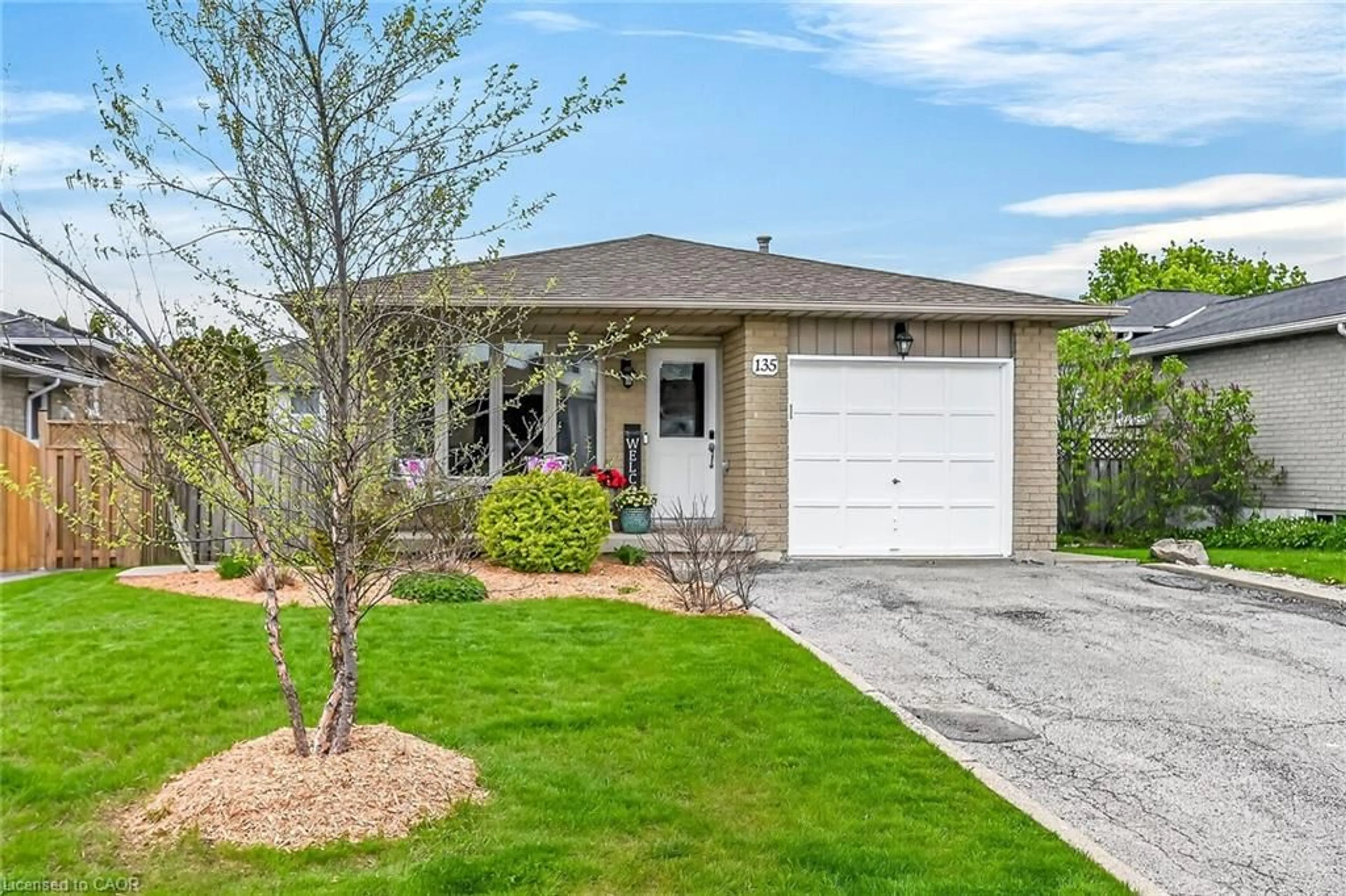 Home with vinyl exterior material, street for 135 Independence Dr, Hamilton Ontario L8W 3C2