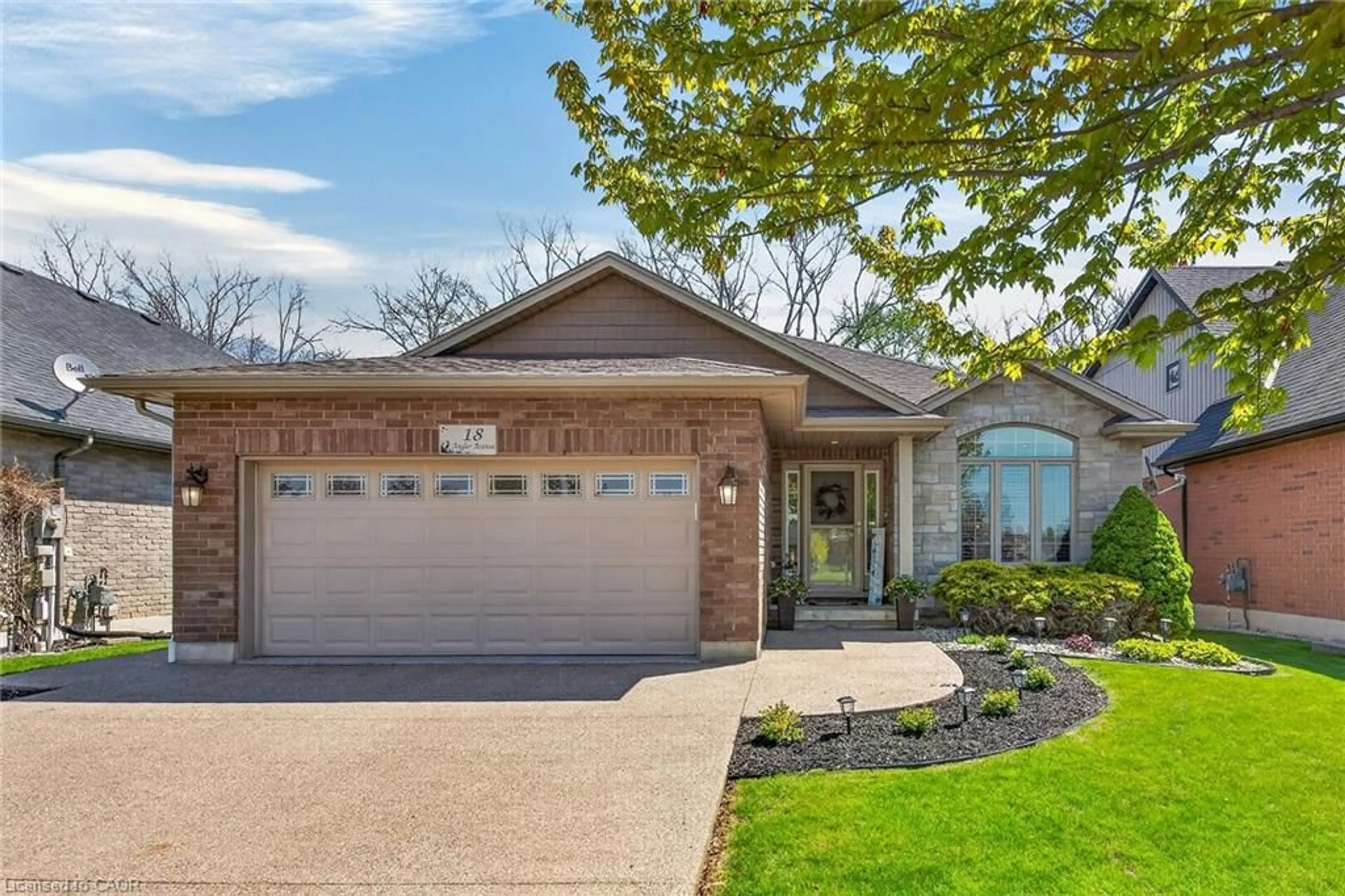 Home with brick exterior material, street for 18 Angler Ave, Port Dover Ontario N0A 1N3