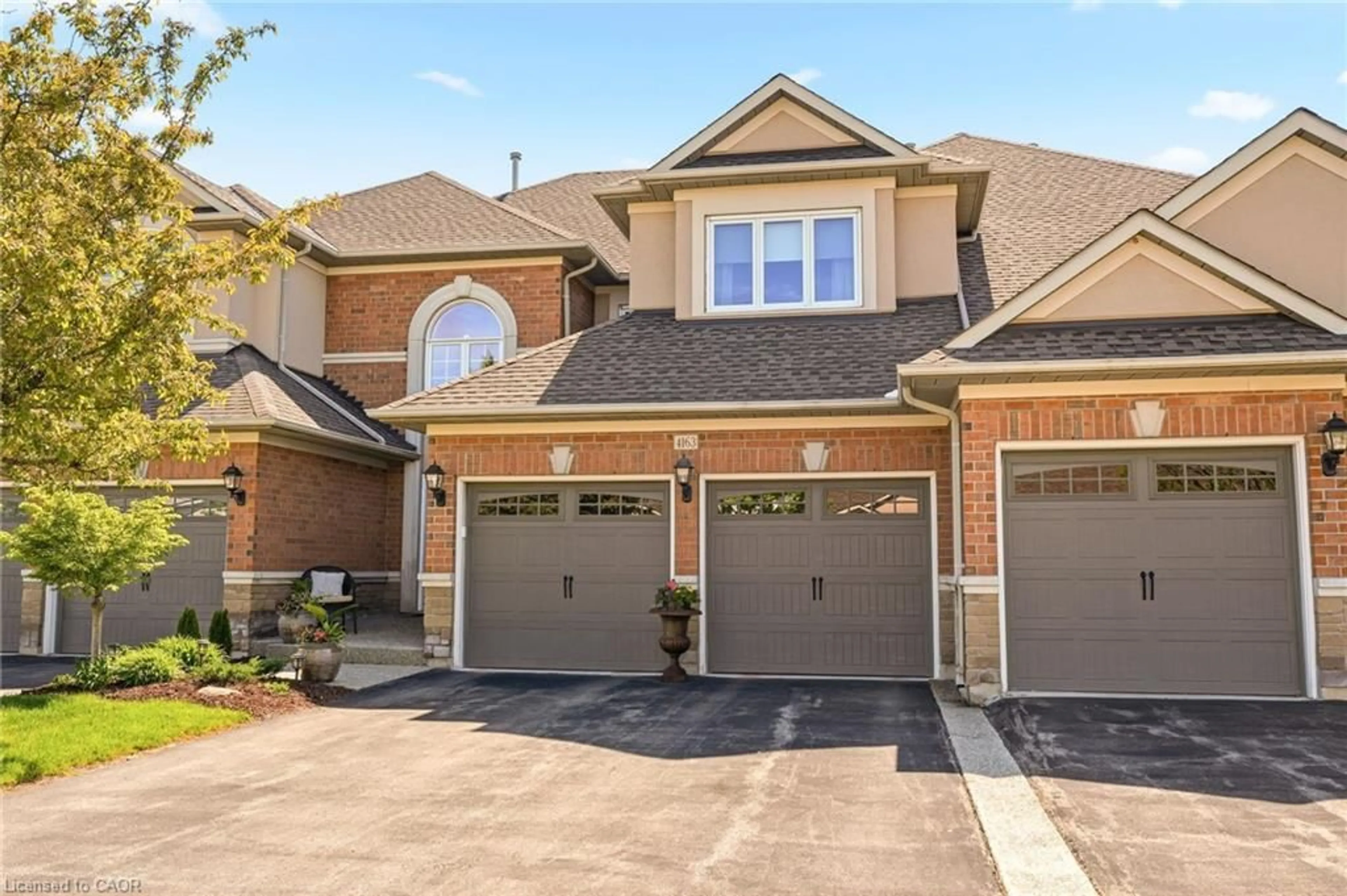 Home with brick exterior material, street for 4163 Stonebridge Cres, Burlington Ontario L7M 4N2