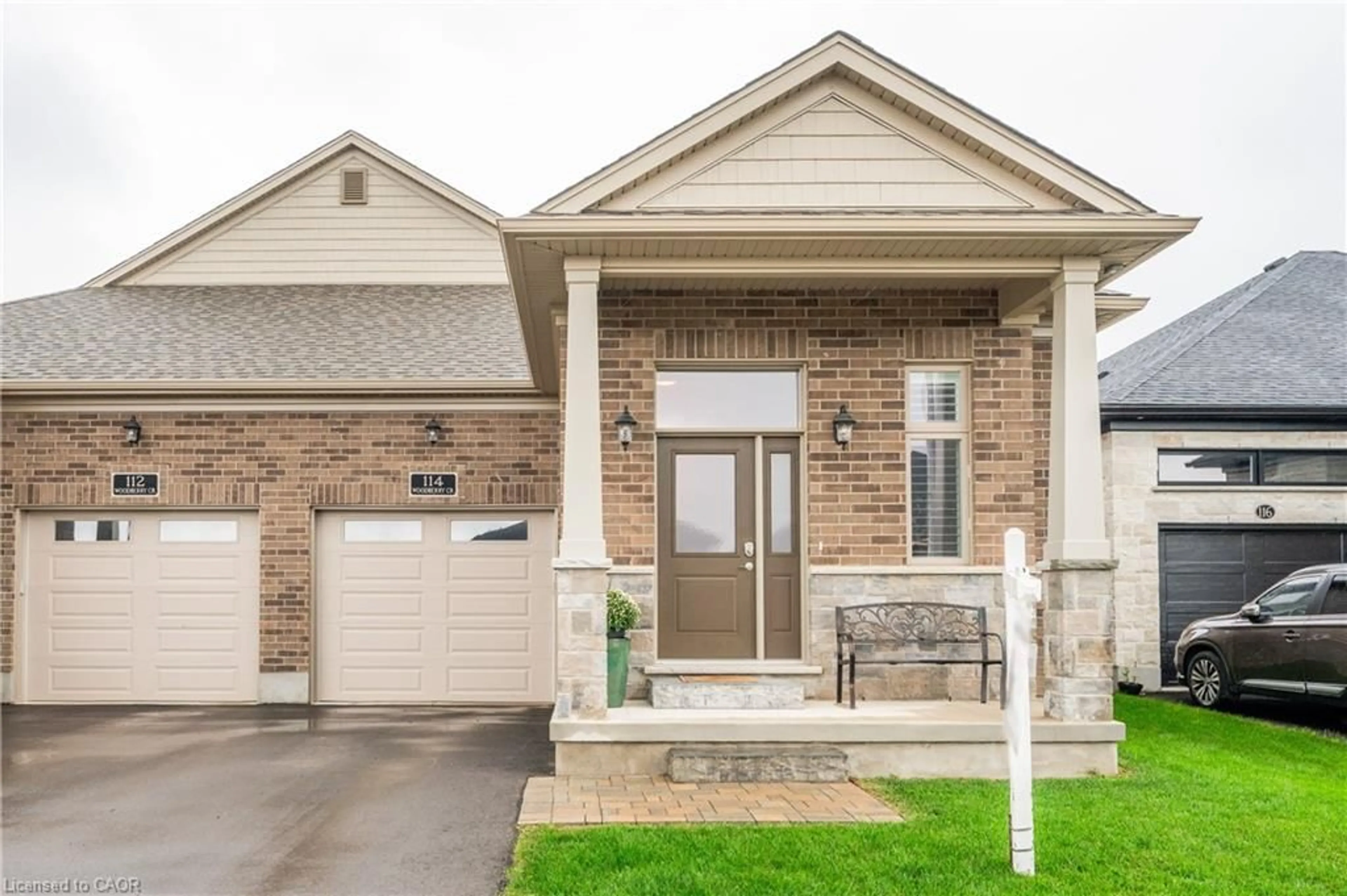 Home with brick exterior material, street for 114 Woodberry Cres, Elmira Ontario N3B 0E3
