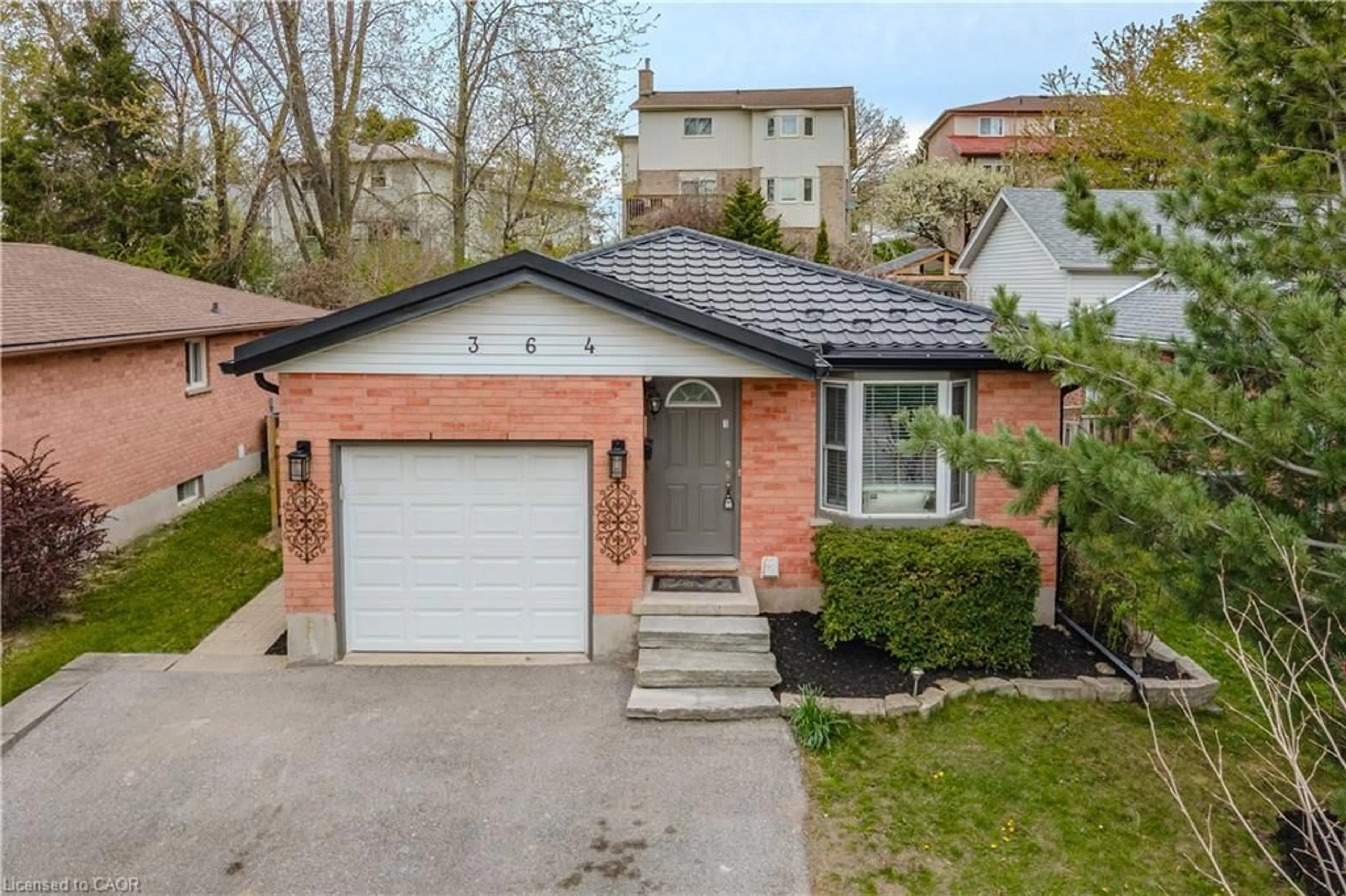 Home with brick exterior material, street for 364 Imperial Rd S Rd, Guelph Ontario N1K 1L4