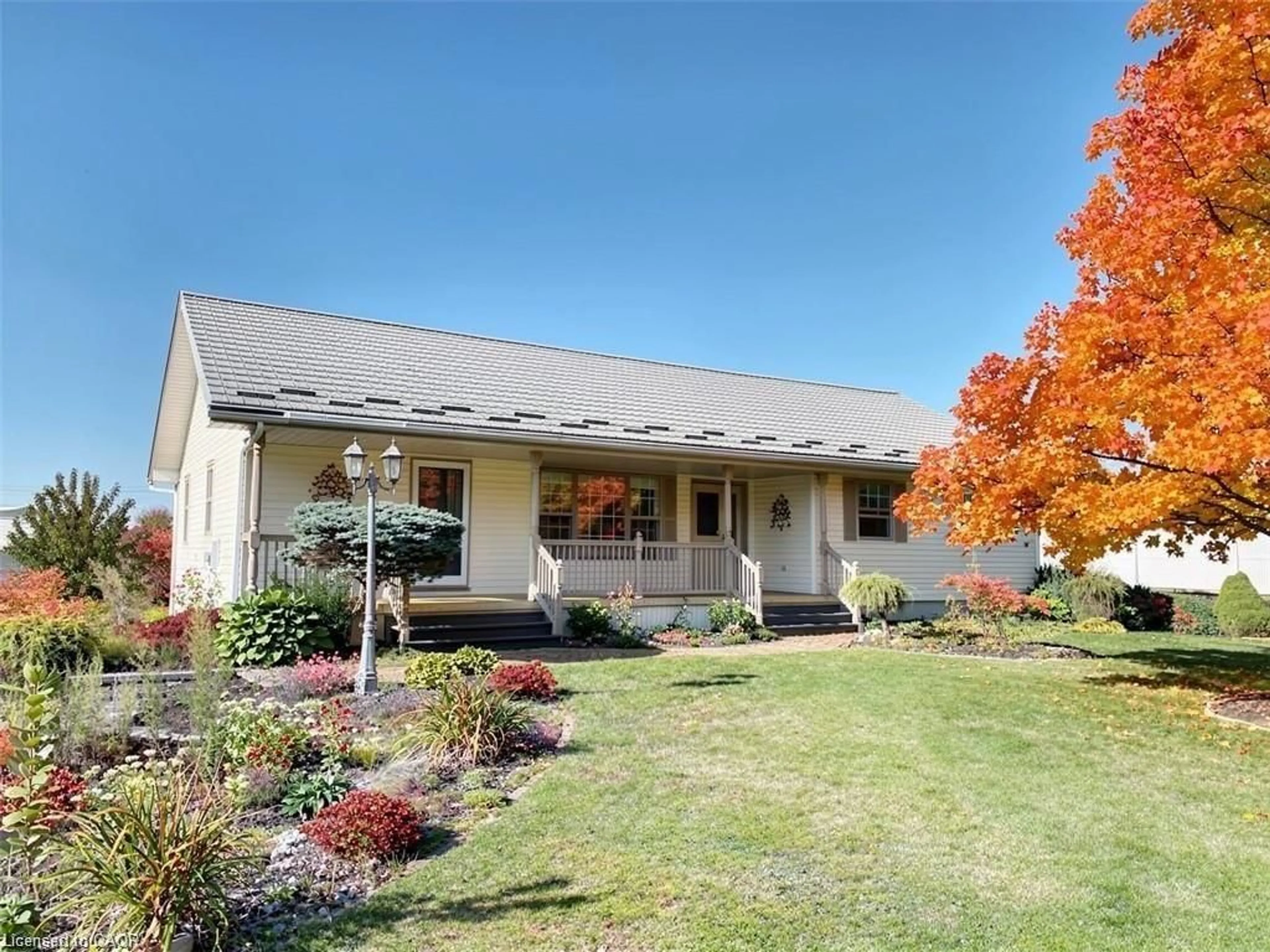 Home with vinyl exterior material, street for 1938 Turkey Point Rd, Simcoe Ontario N3Y 4J9