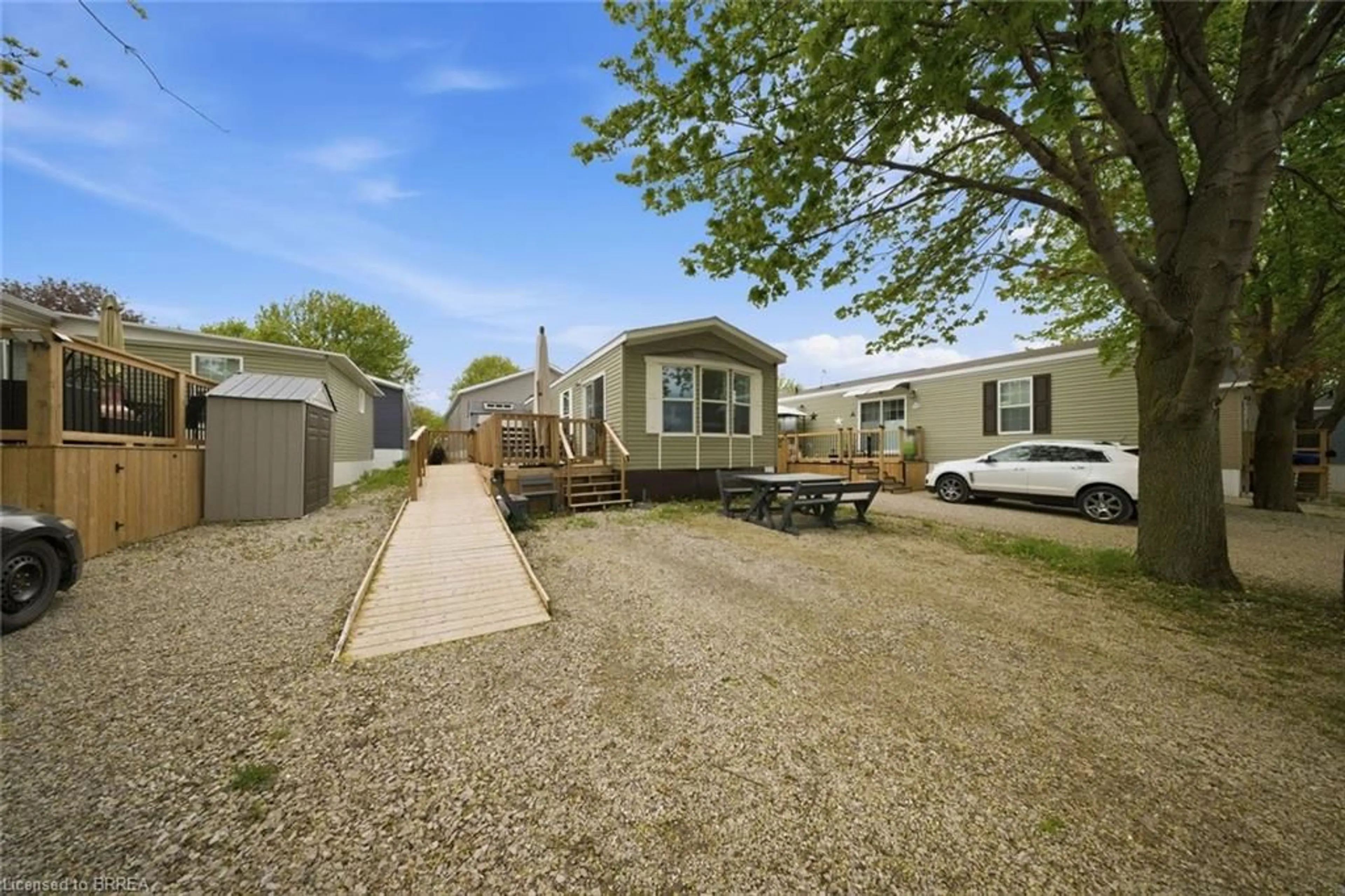 A pic from outside/outdoor area/front of a property/back of a property/a pic from drone, street for 99 Fourth Concession Rd #614, Burford Ontario N0E 1A0