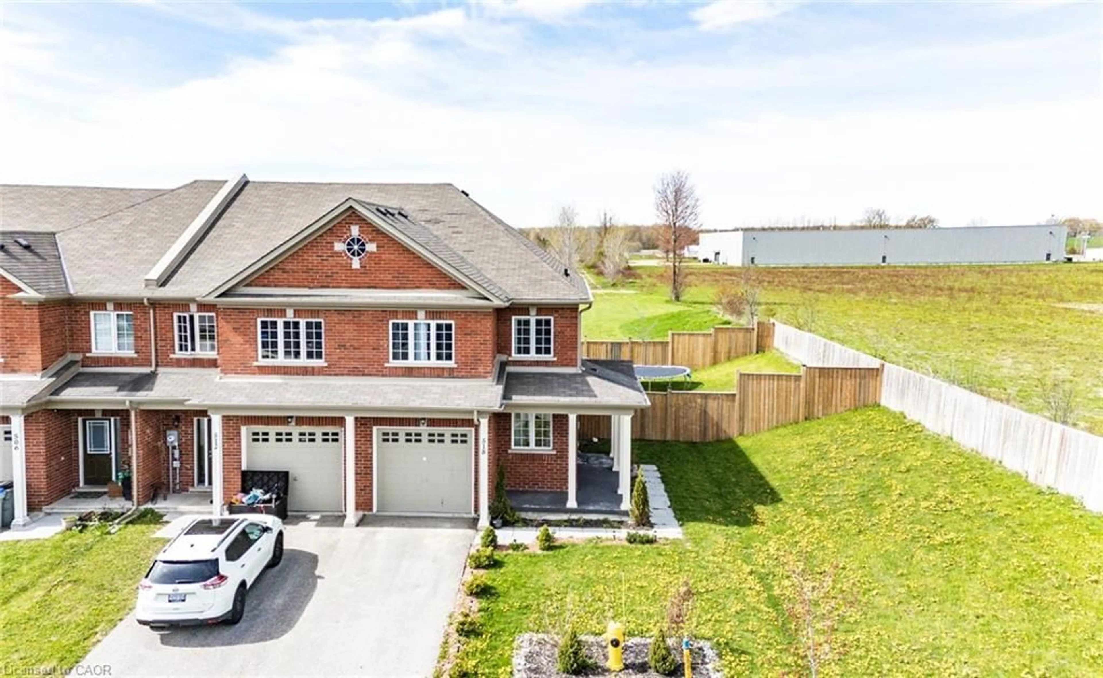 A pic from outside/outdoor area/front of a property/back of a property/a pic from drone, street for 518 Krotz St, Listowel Ontario N4W 0J4