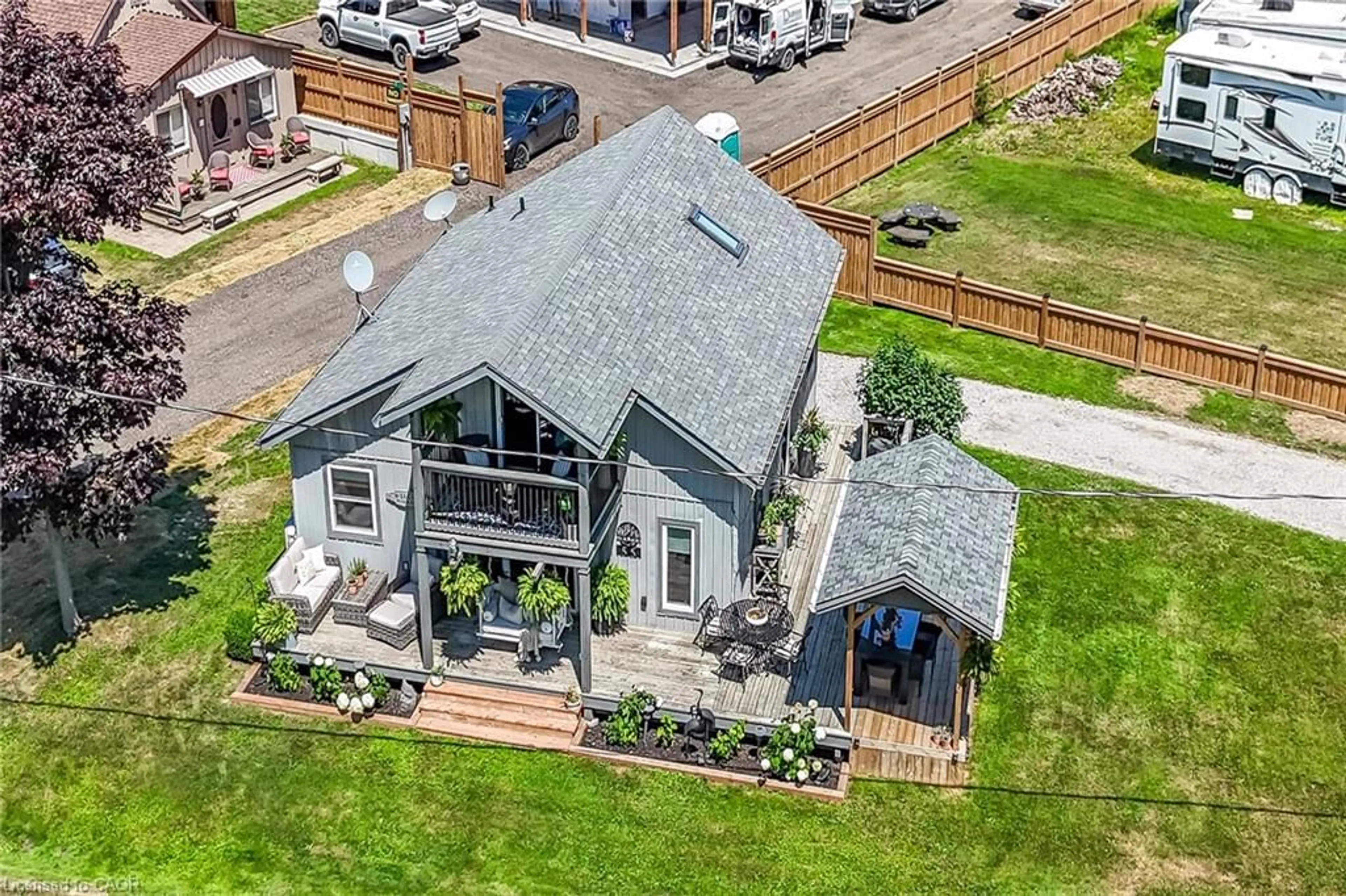A pic from outside/outdoor area/front of a property/back of a property/a pic from drone, unknown for 55 Lakeside Dr, Peacock Point Ontario N0A 1L0