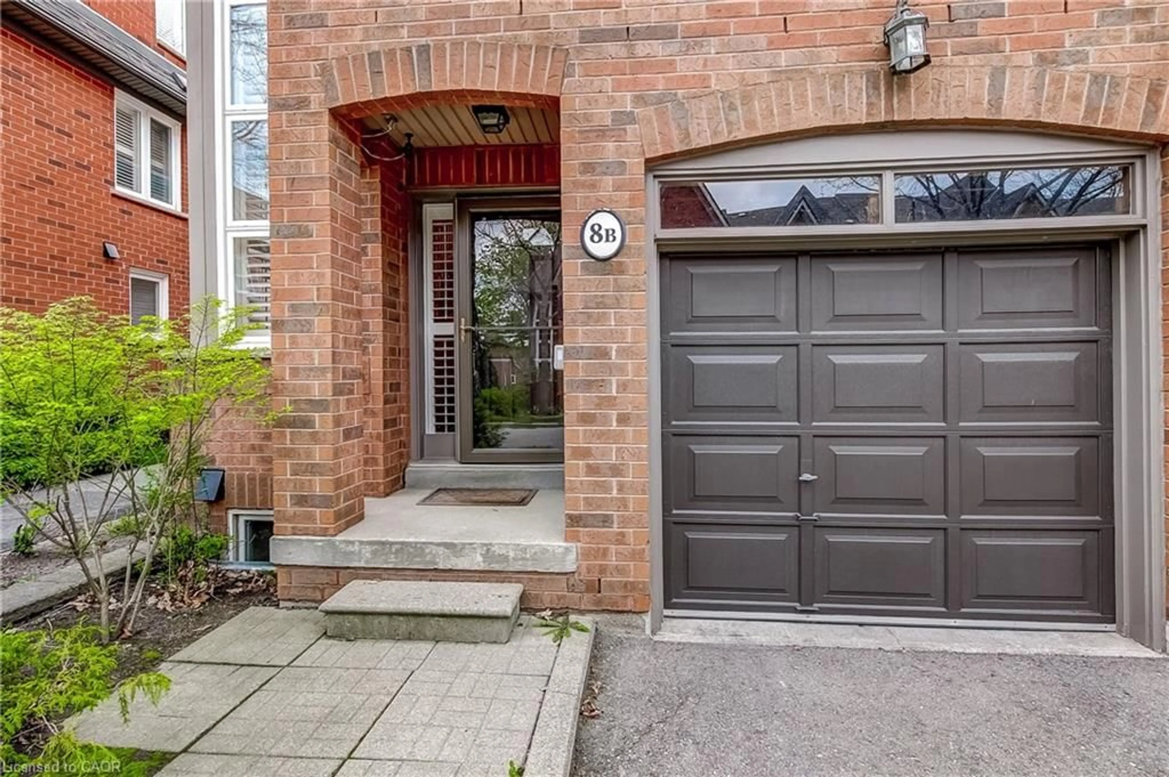 Home with brick exterior material, street for 1084 Queen St #8B, Mississauga Ontario L5H 4K4