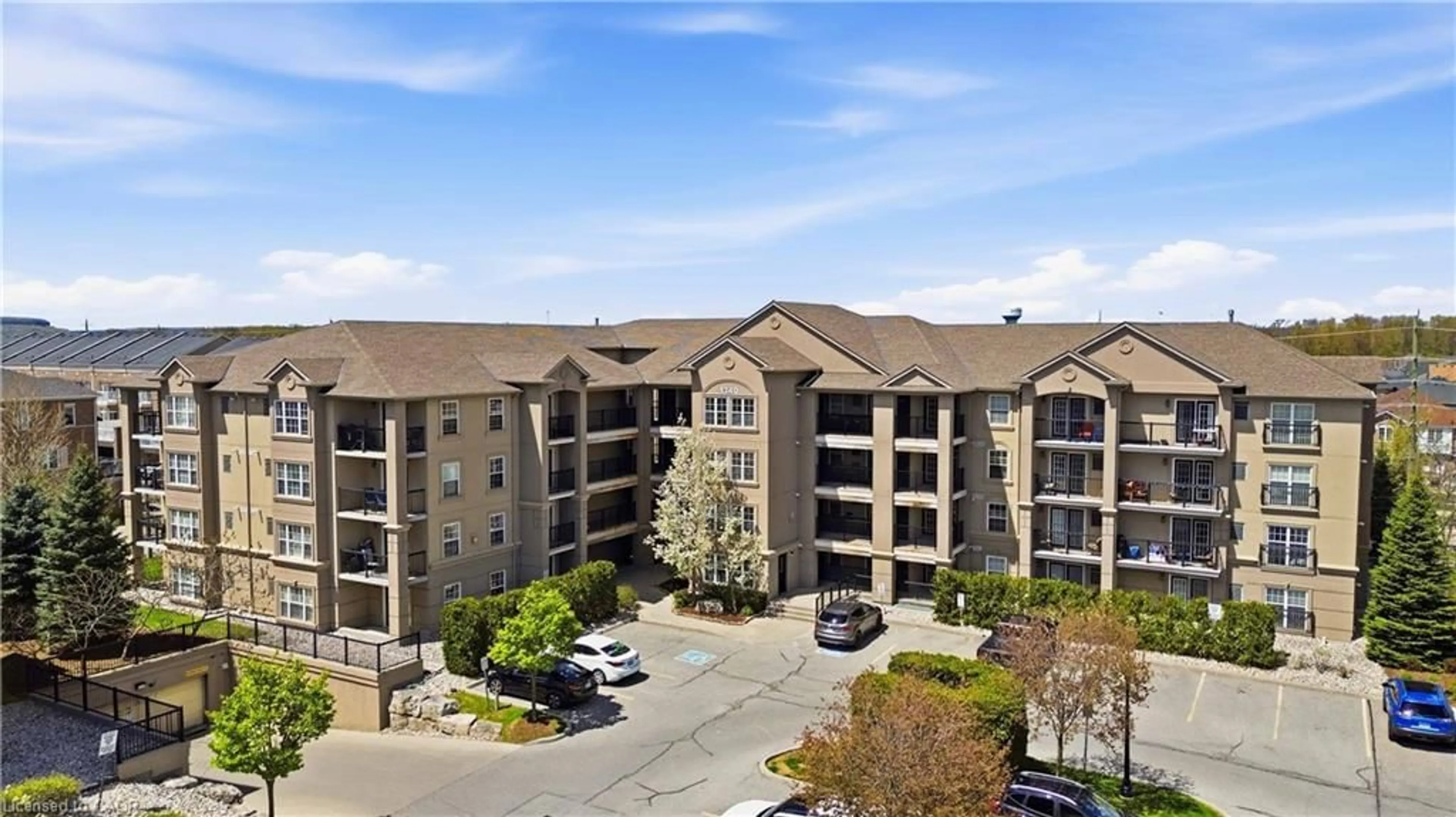 A pic from outside/outdoor area/front of a property/back of a property/a pic from drone, building for 1340 Main St #113, Milton Ontario L9T 7S6