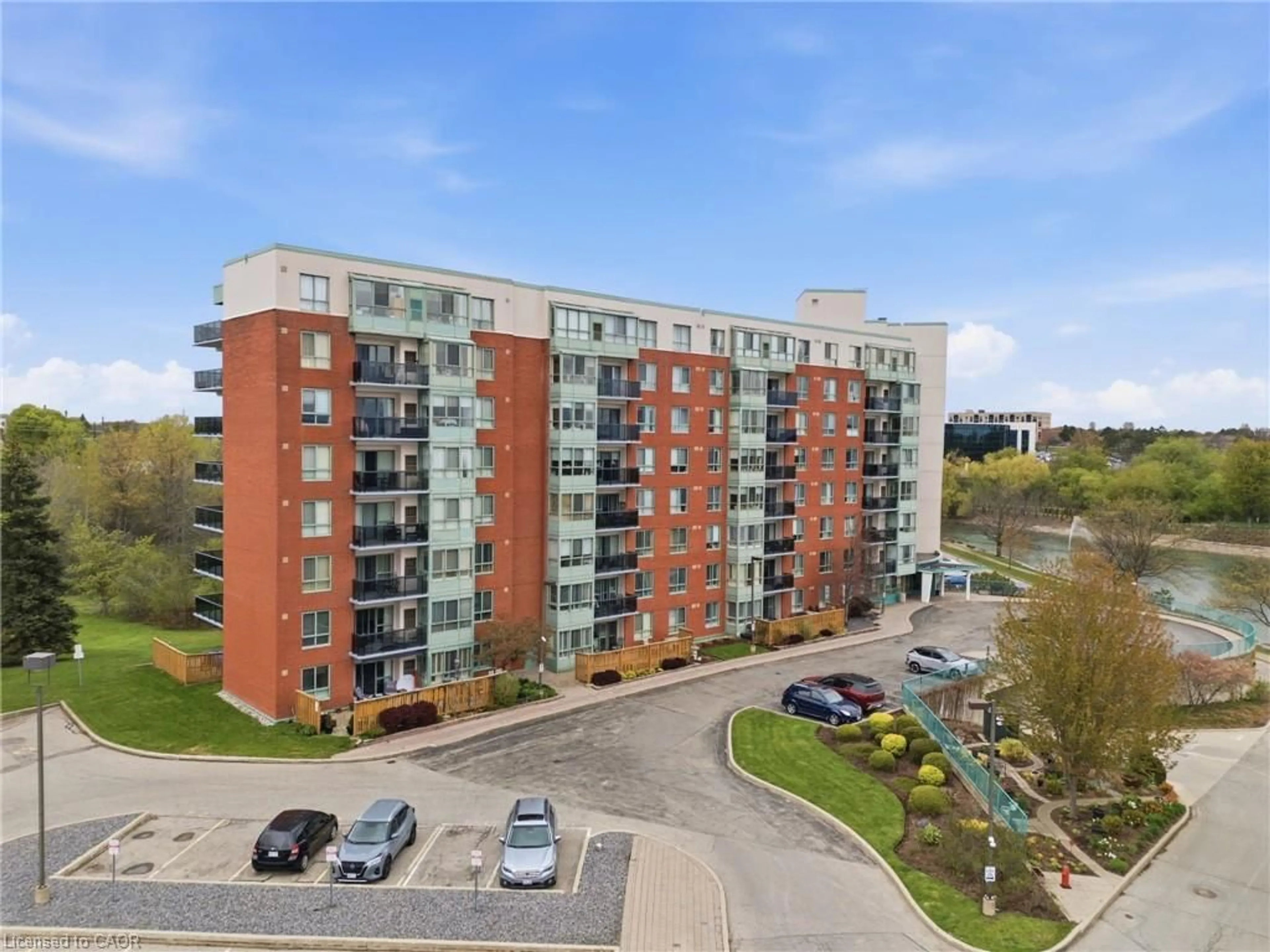 A pic from outside/outdoor area/front of a property/back of a property/a pic from drone, unknown for 30 Blue Springs Dr #215, Waterloo Ontario N2J 4T2