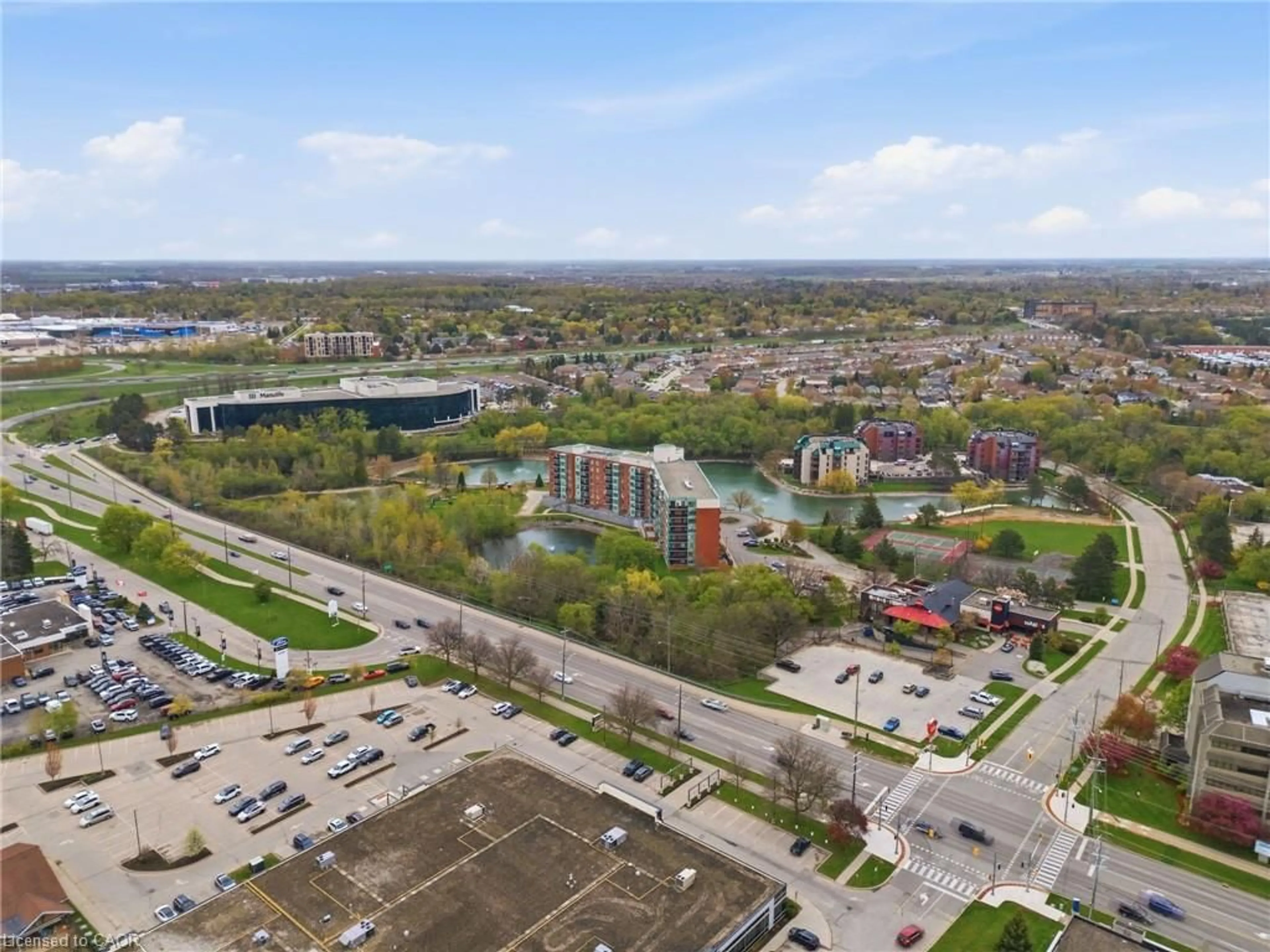 A pic from outside/outdoor area/front of a property/back of a property/a pic from drone, unknown for 30 Blue Springs Dr #215, Waterloo Ontario N2J 4T2