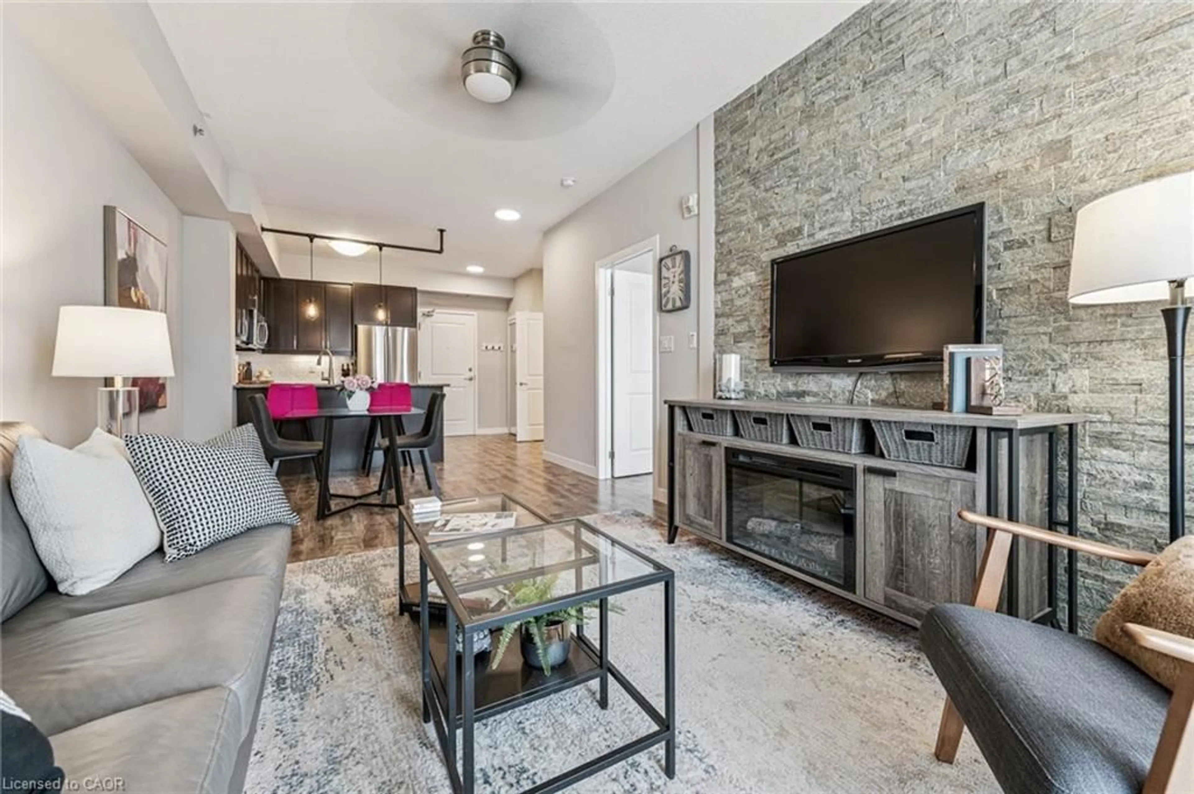Living room with furniture, unknown for 5317 Upper Middle Rd #312, Burlington Ontario L7L 0G8