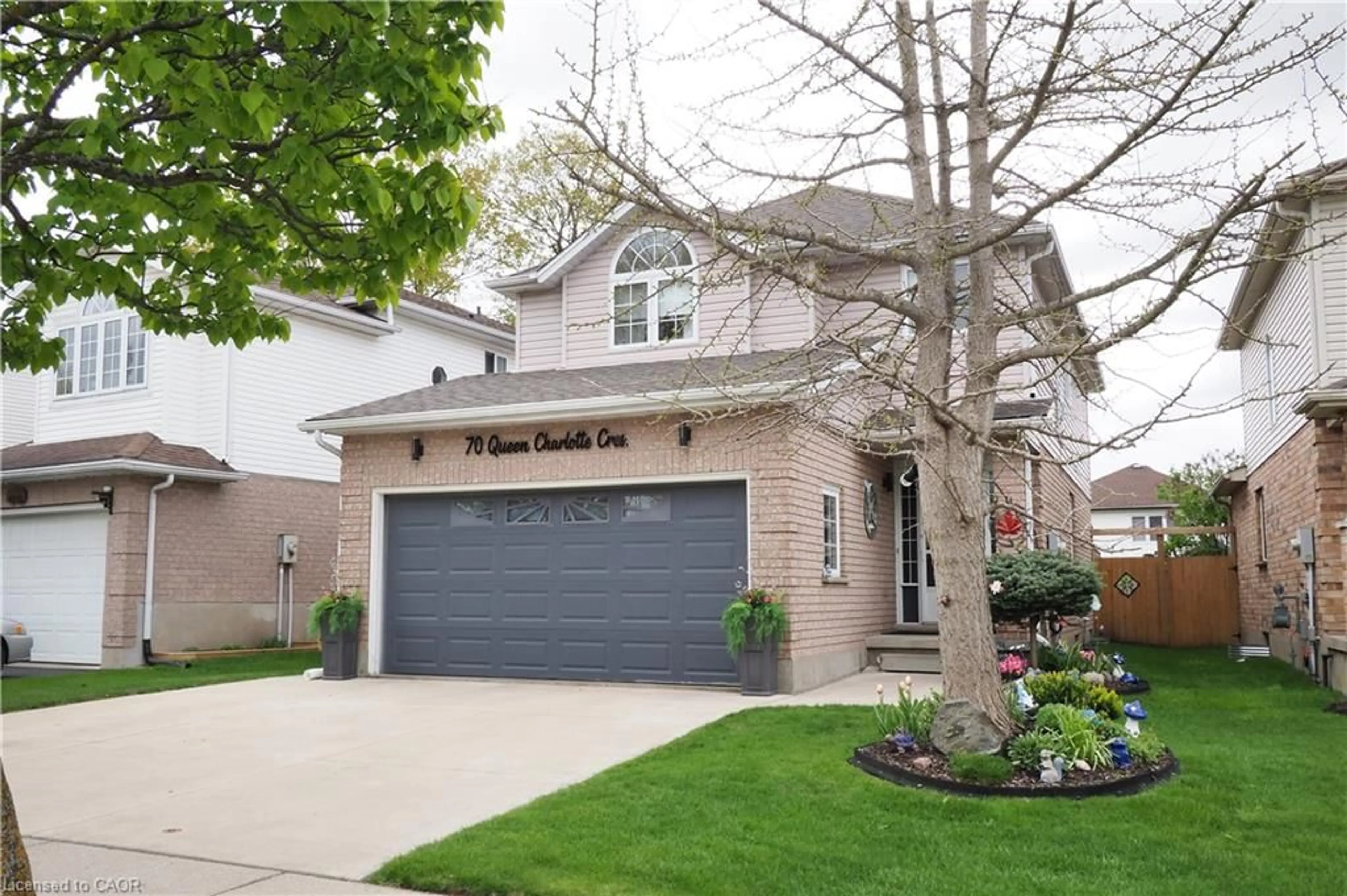 Home with brick exterior material, street for 70 Queen Charlotte Cres, Kitchener Ontario N2E 3N6