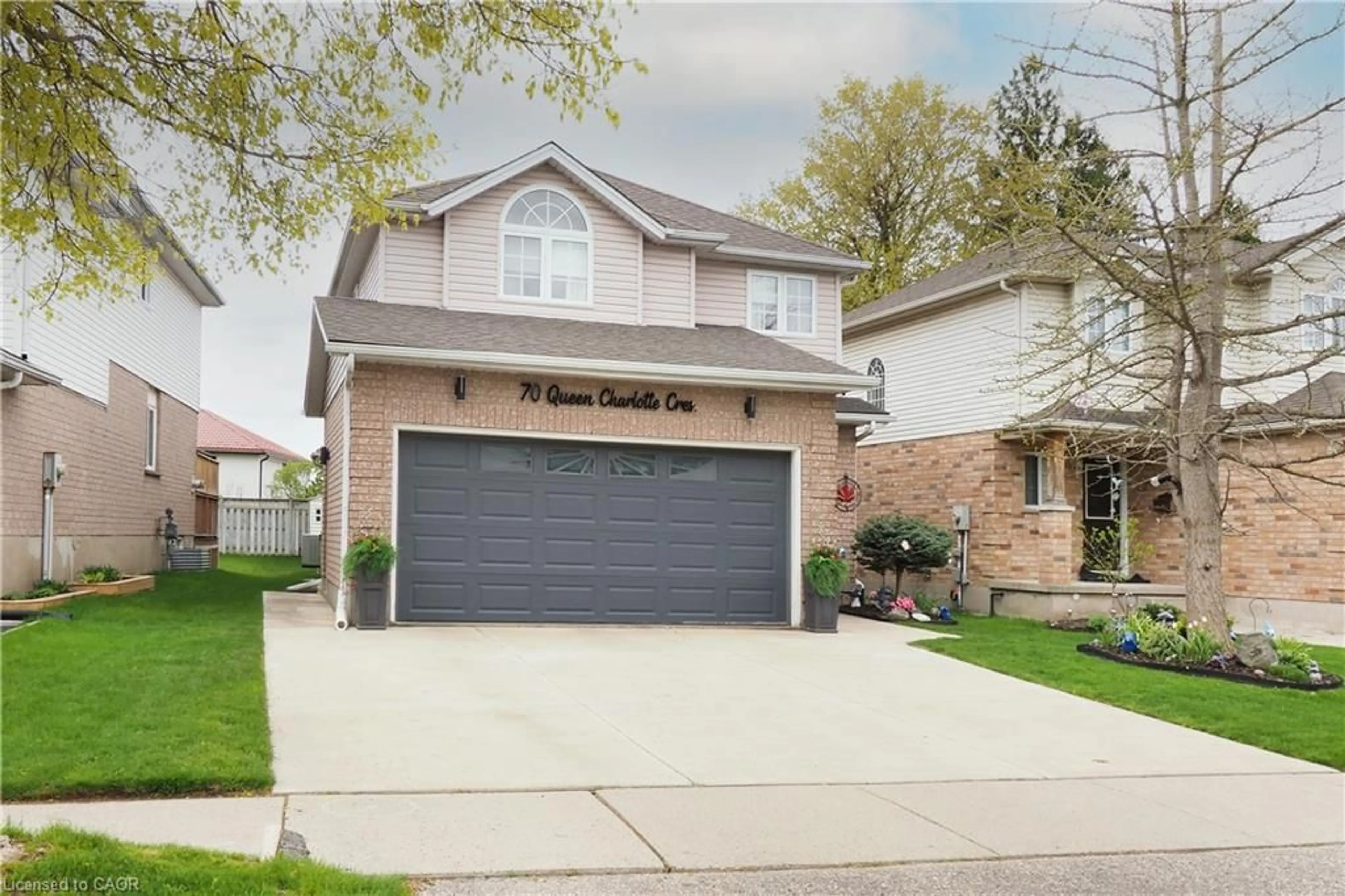 Home with vinyl exterior material, street for 70 Queen Charlotte Cres, Kitchener Ontario N2E 3N6