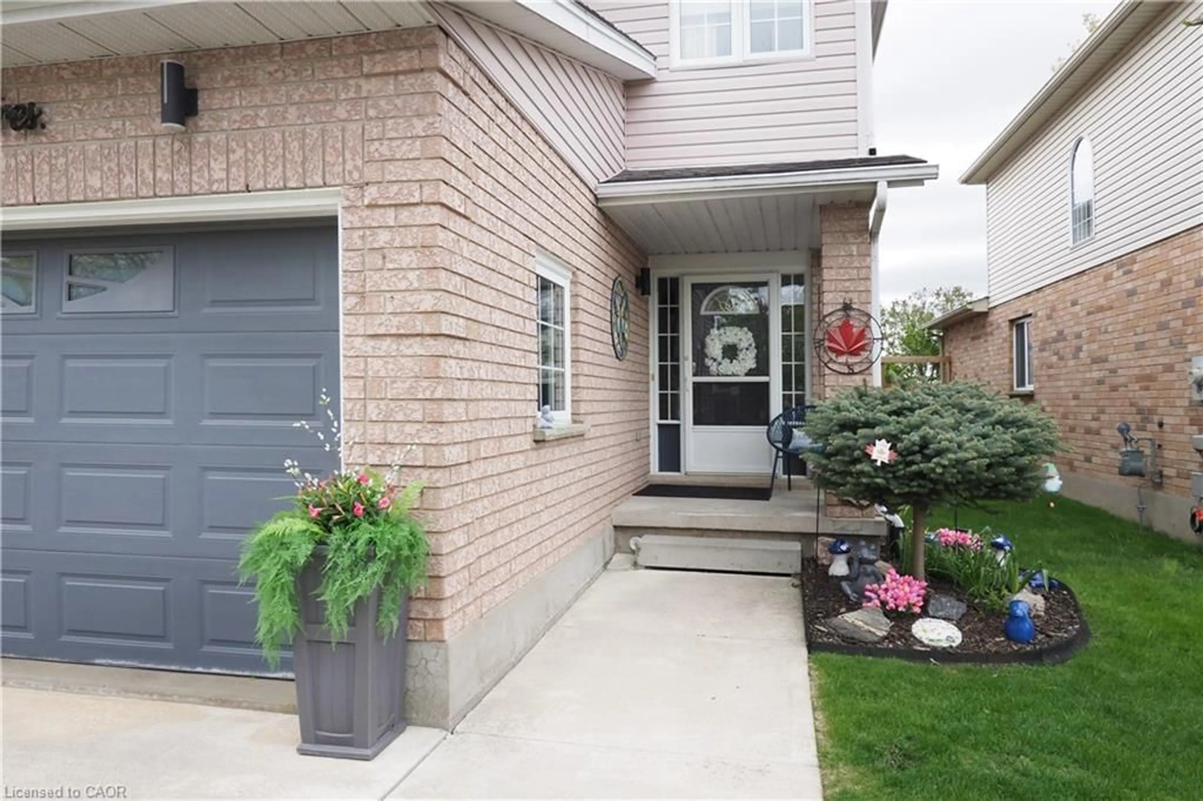 Home with brick exterior material, street for 70 Queen Charlotte Cres, Kitchener Ontario N2E 3N6