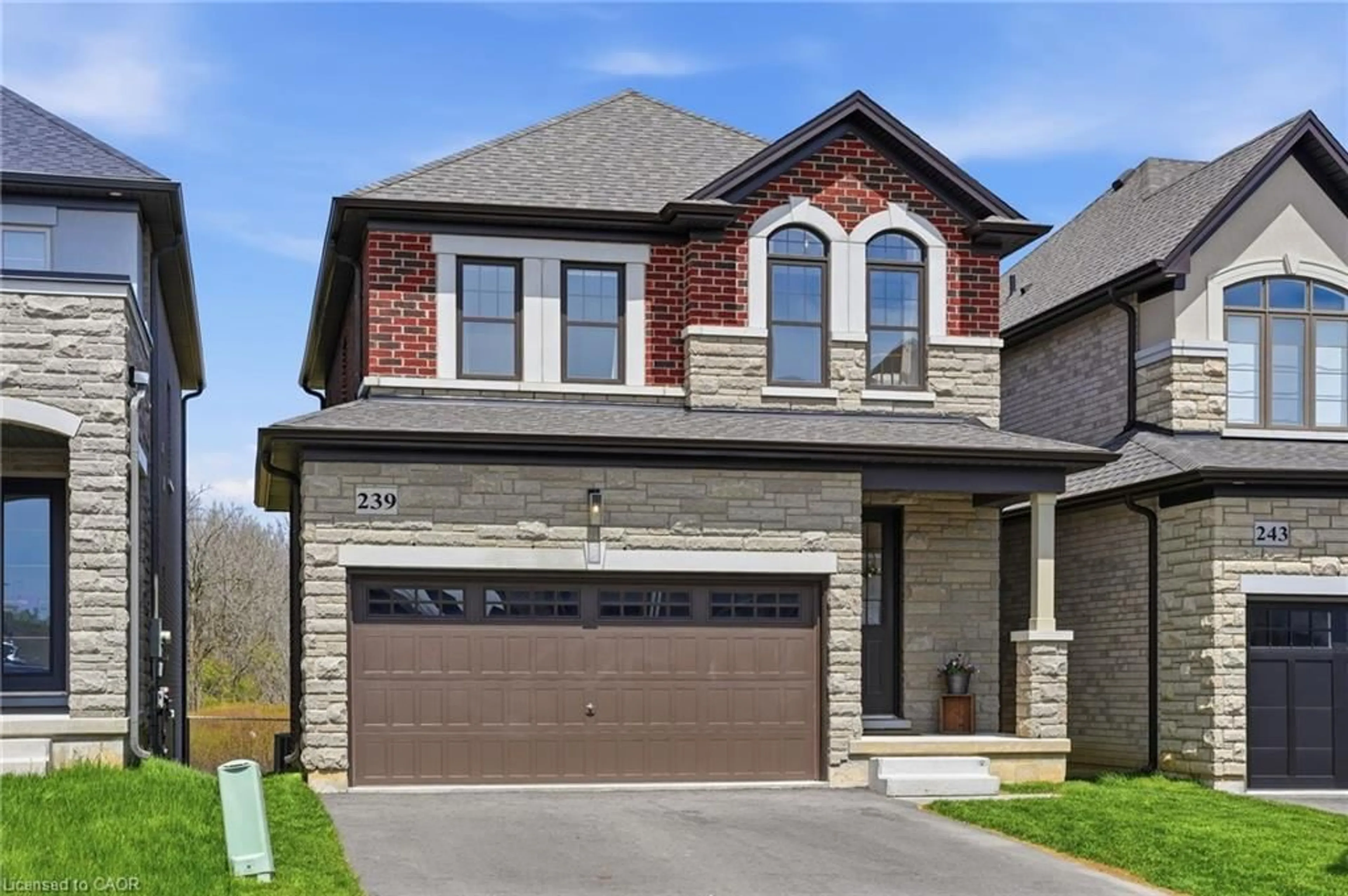 Home with brick exterior material, street for 239 Alessio Dr, Hamilton Ontario L9B 0K7