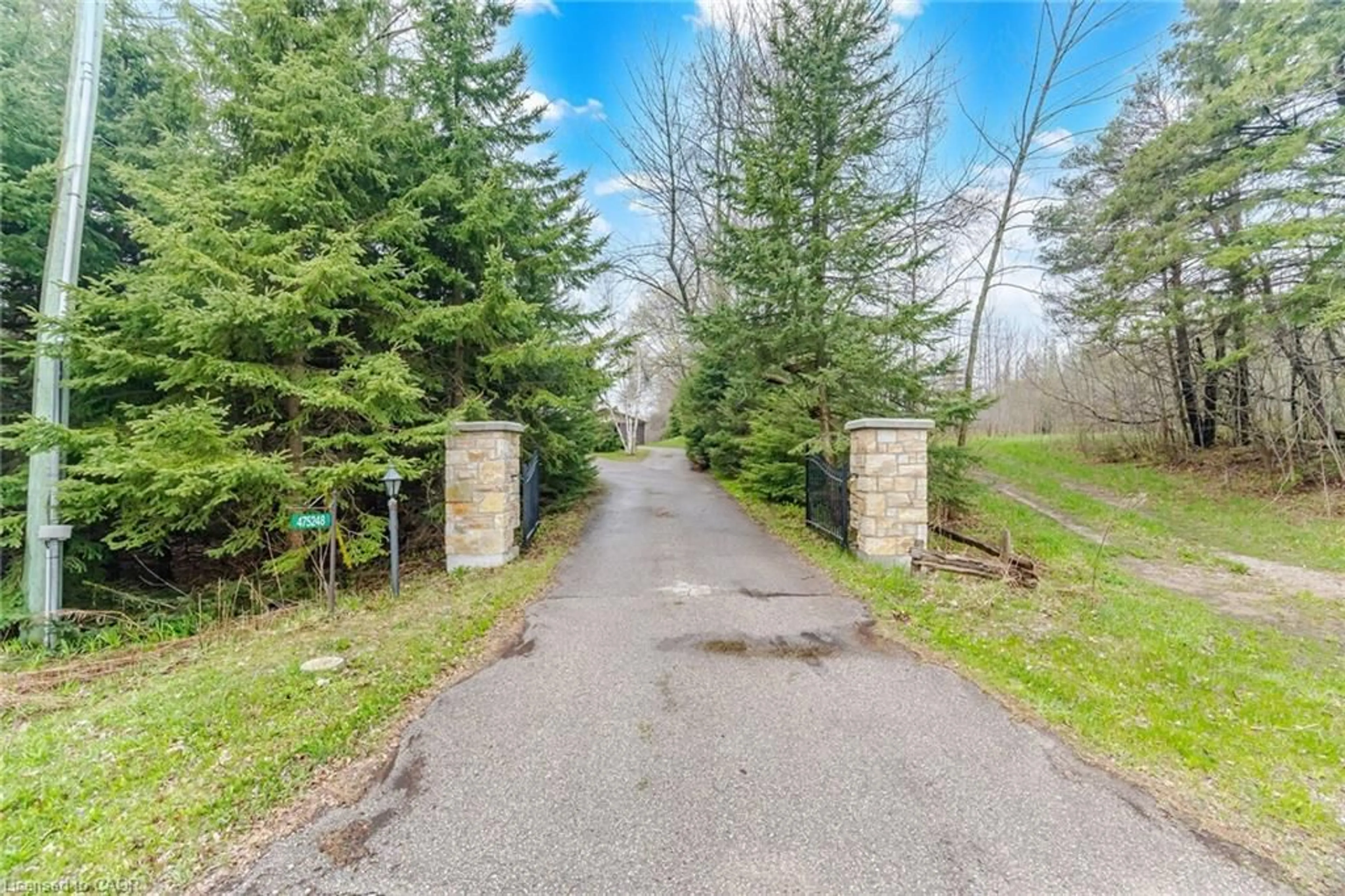 A pic from outside/outdoor area/front of a property/back of a property/a pic from drone, forest/trees view for 475248 County Rd 11, Amaranth Ontario L9W 0R6