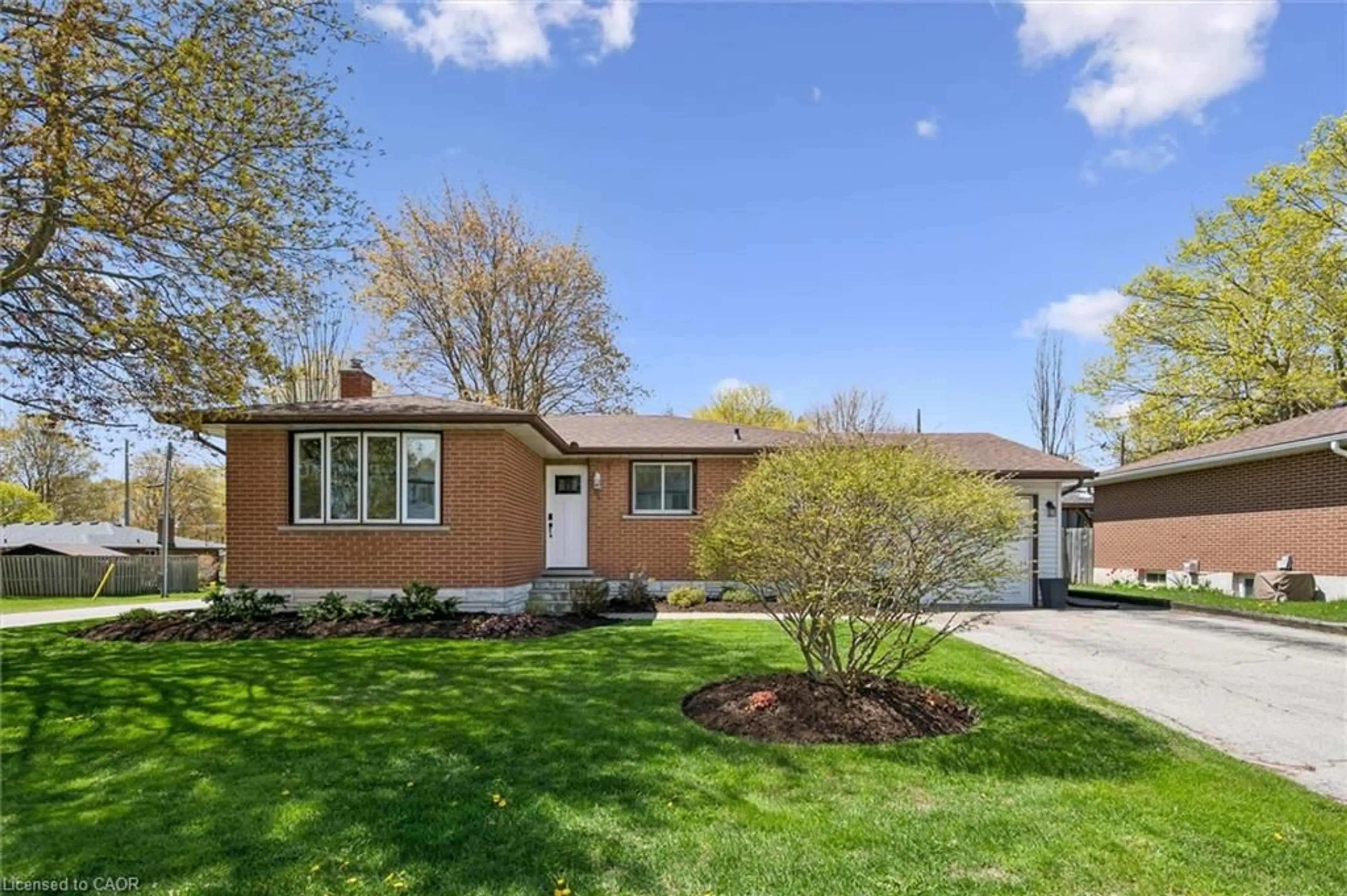 Home with brick exterior material, street for 204 Irvine St, Elora Ontario N0B 1S0