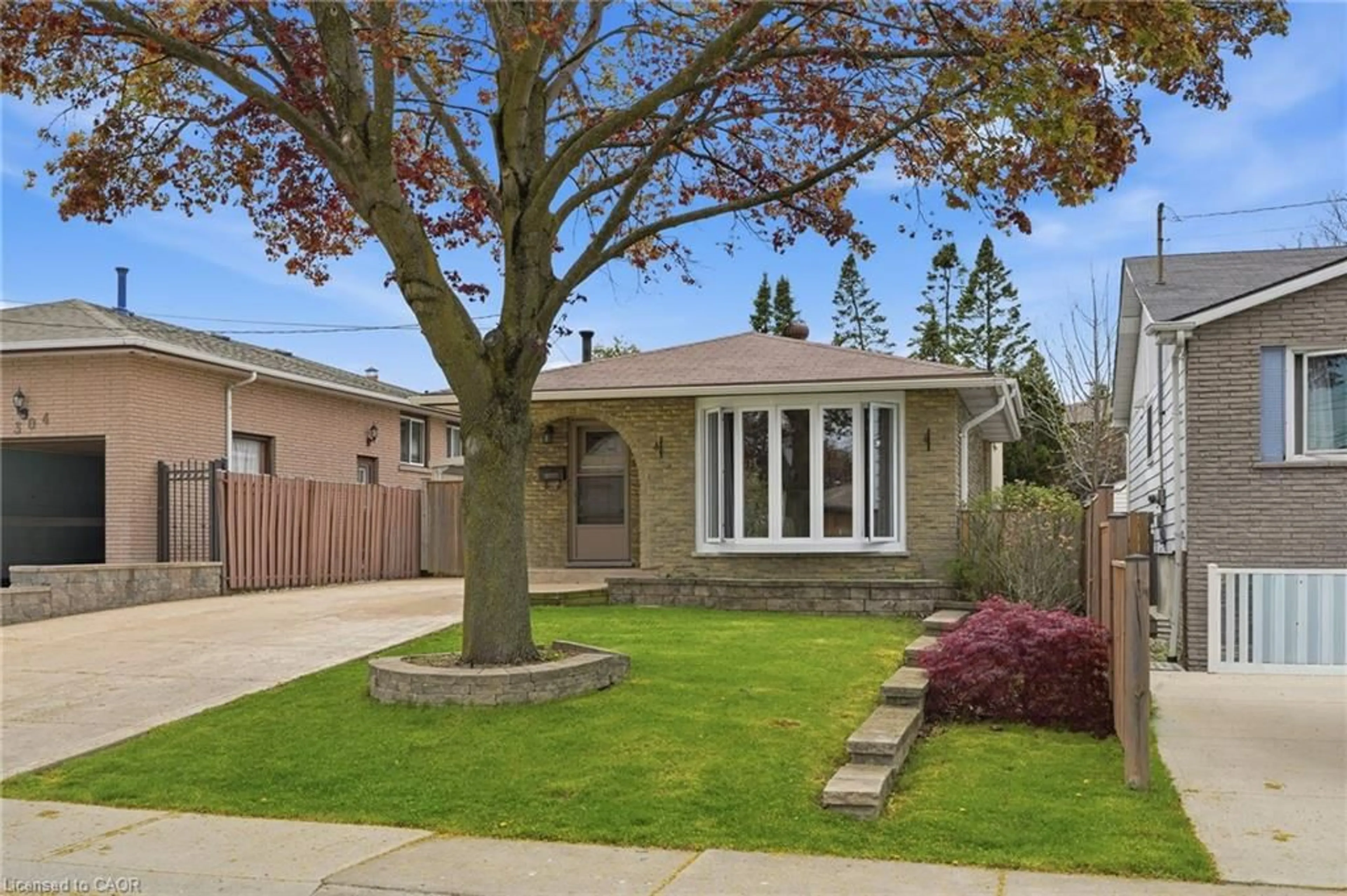 Home with brick exterior material, street for 300 Eaglewood Dr, Hamilton Ontario L8W 1T5