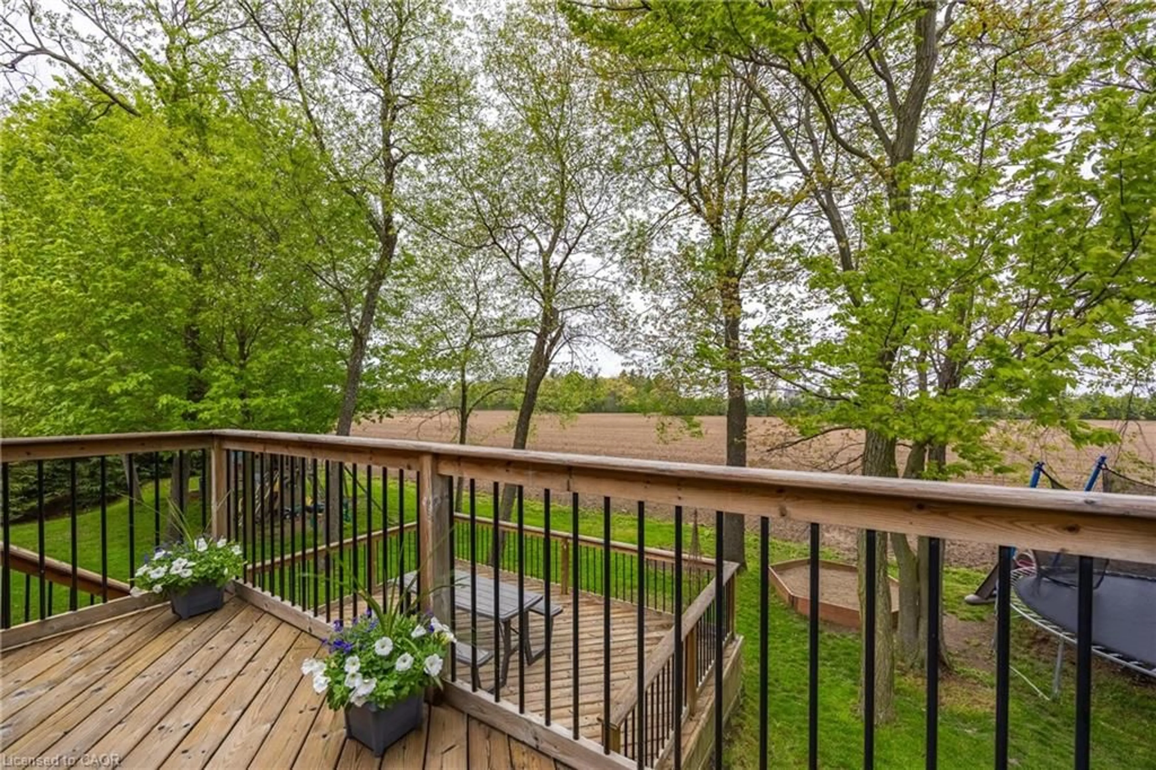 Patio, forest/trees view for 64 Wintergreen Cres, Delhi Ontario N4B 2W5