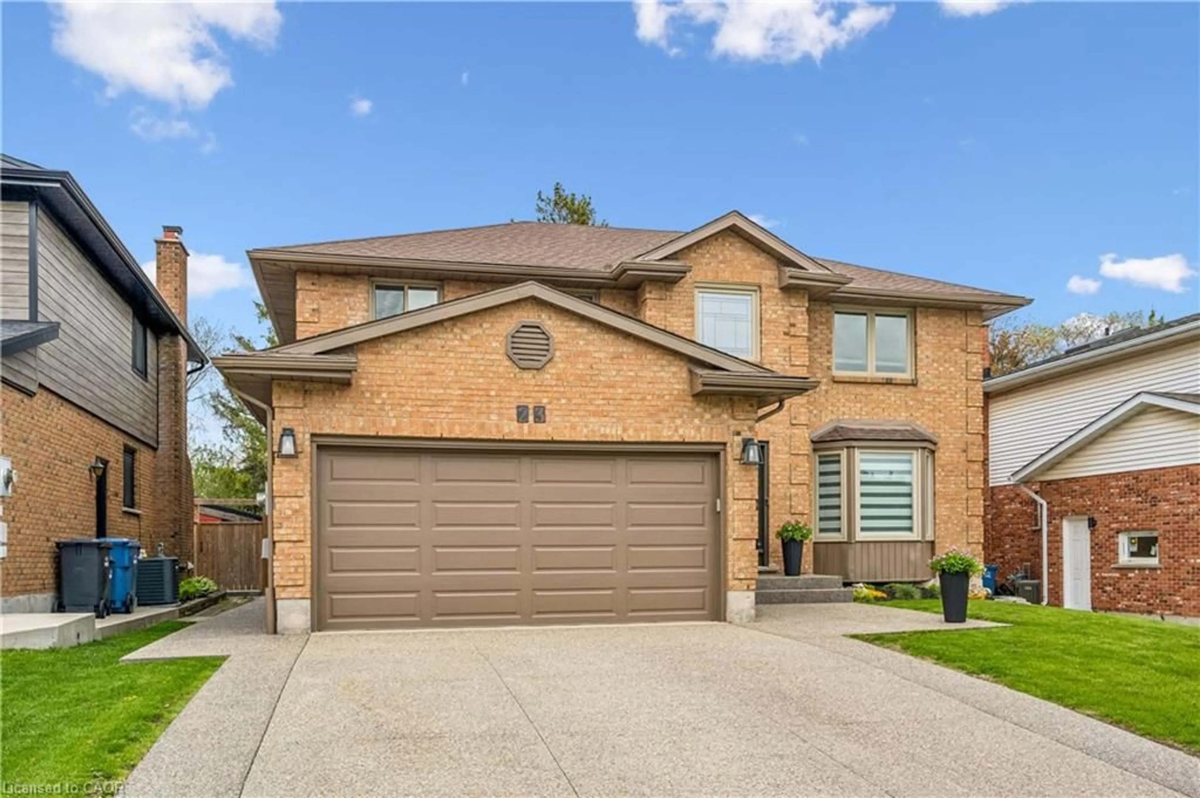 Home with brick exterior material, street for 23 Old Colony Trail, Guelph Ontario N1G 4A4