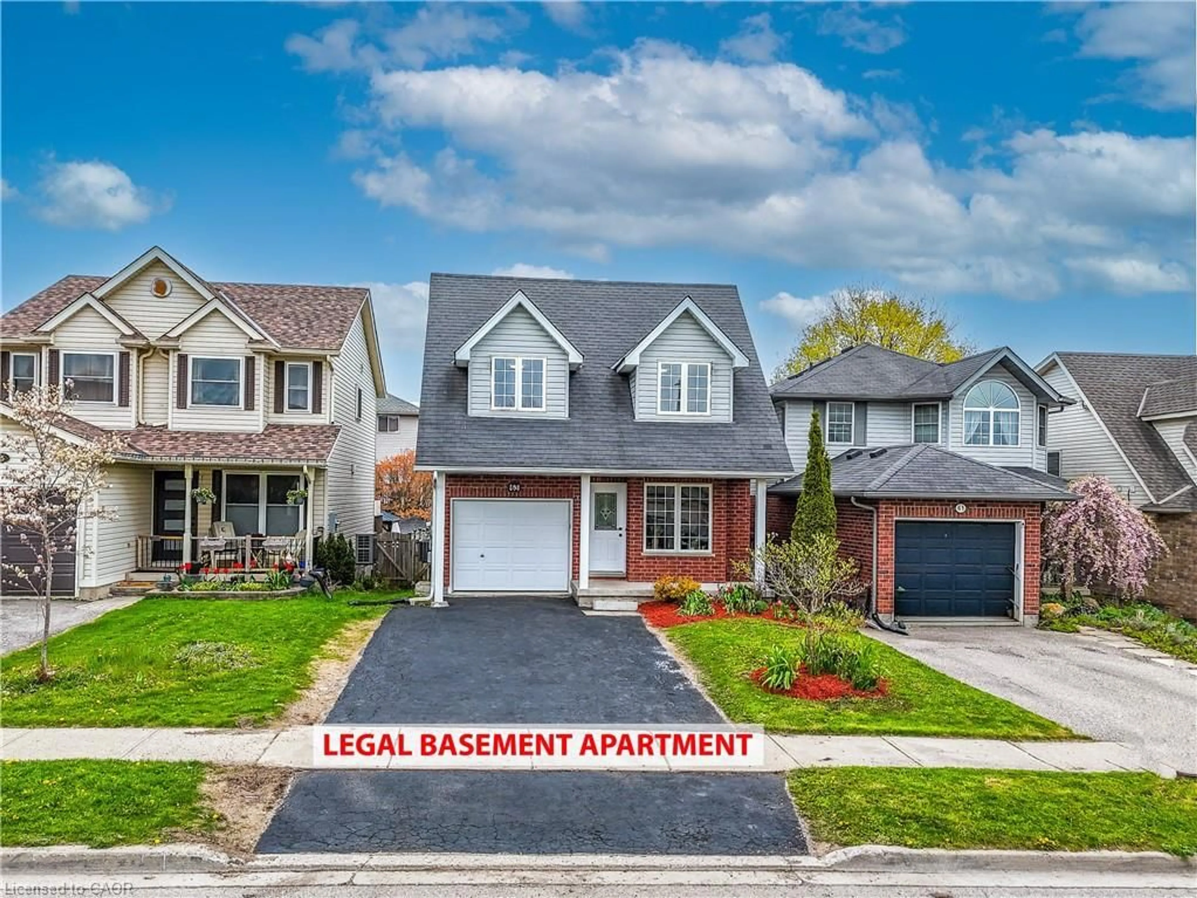 Home with vinyl exterior material, street for 63 Hagan Ave, Guelph Ontario N1E 7B7