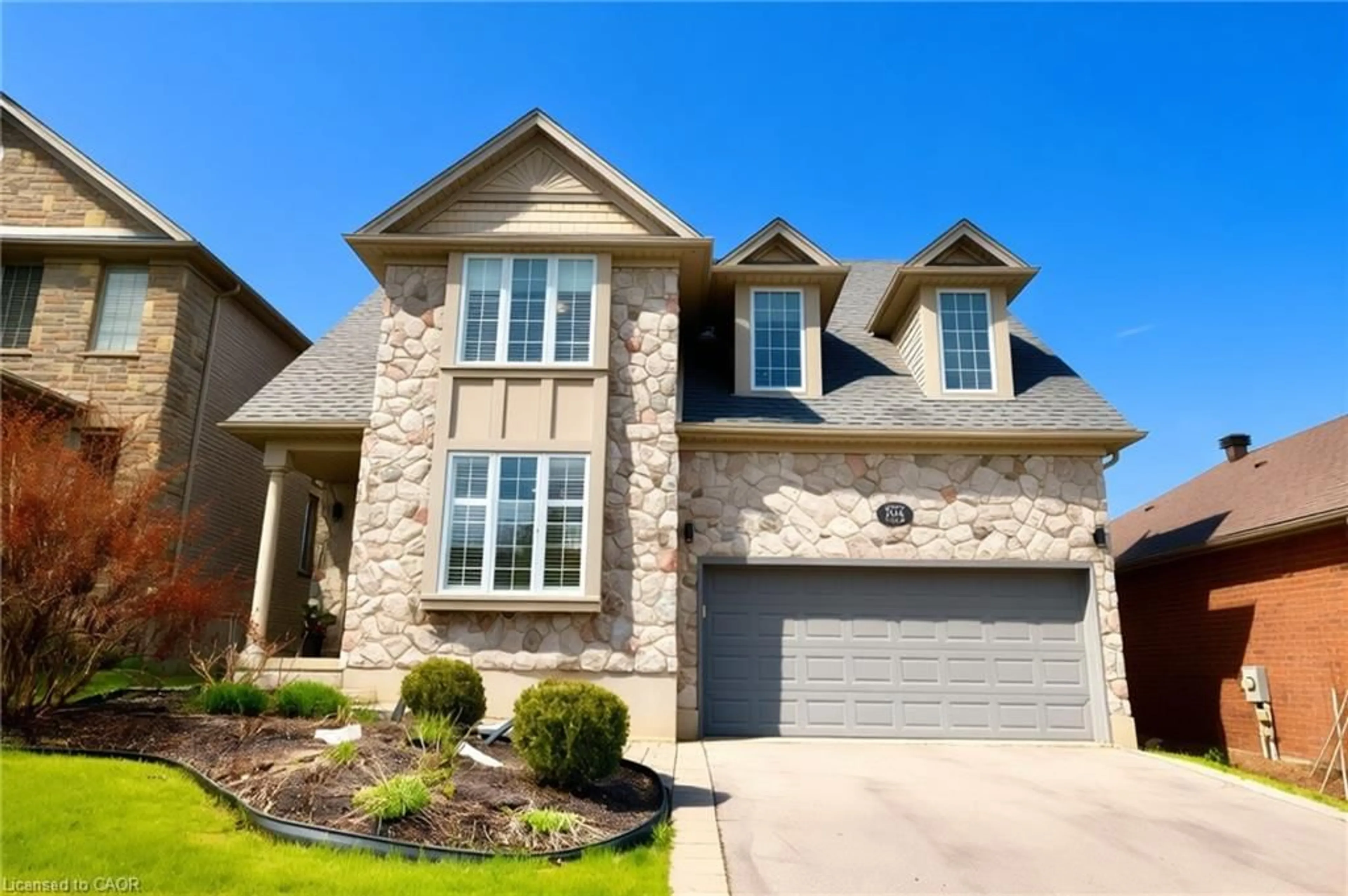 Home with brick exterior material, street for 704 Zurich Dr, Waterloo Ontario N2V 2S8