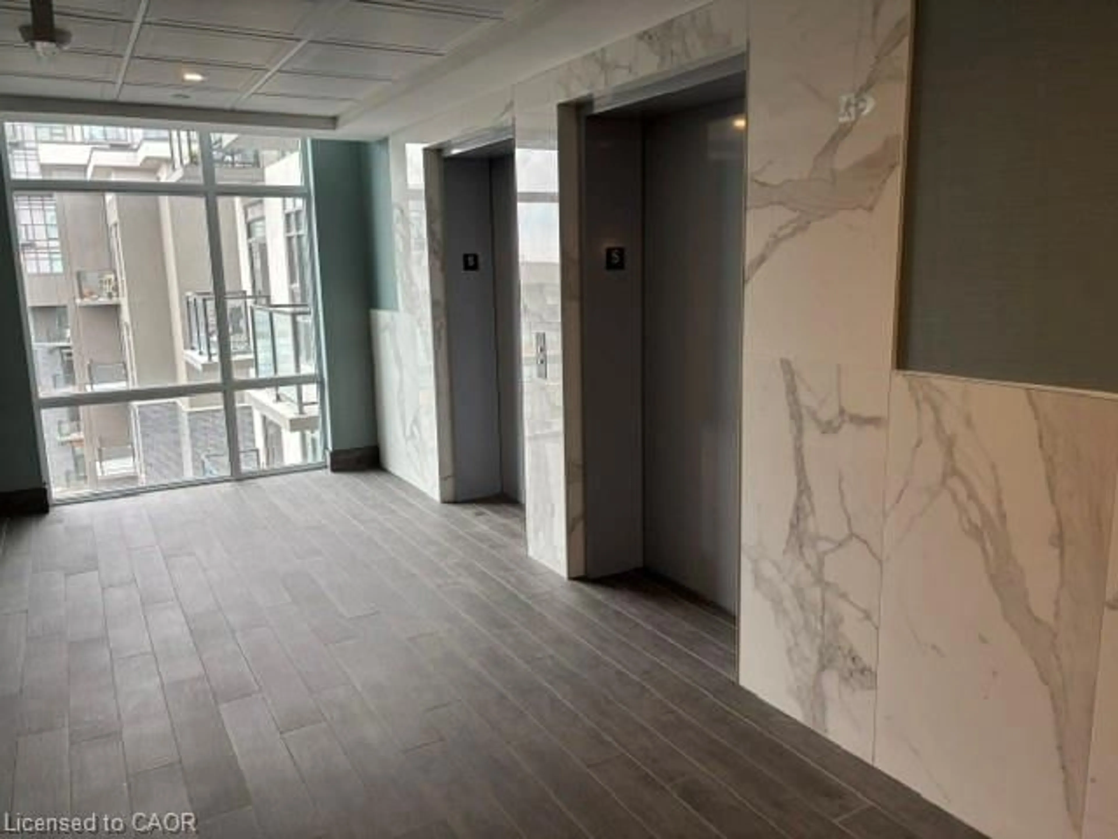 Indoor foyer for 10 Mallard Trail #527, Waterdown Ontario L8B 2A7