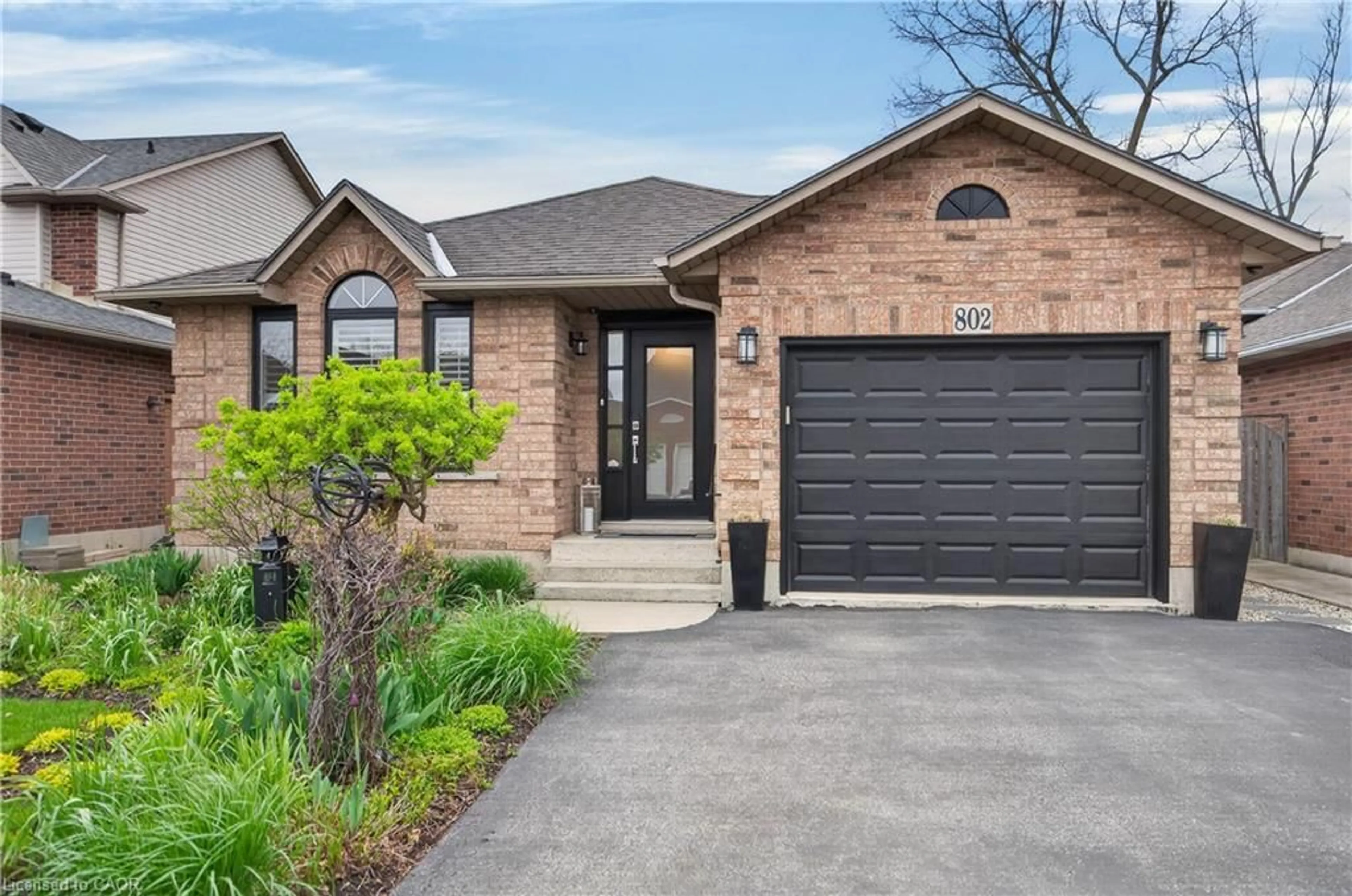 Home with brick exterior material, street for 802 Upper Horning Rd, Hamilton Ontario L9C 7R4