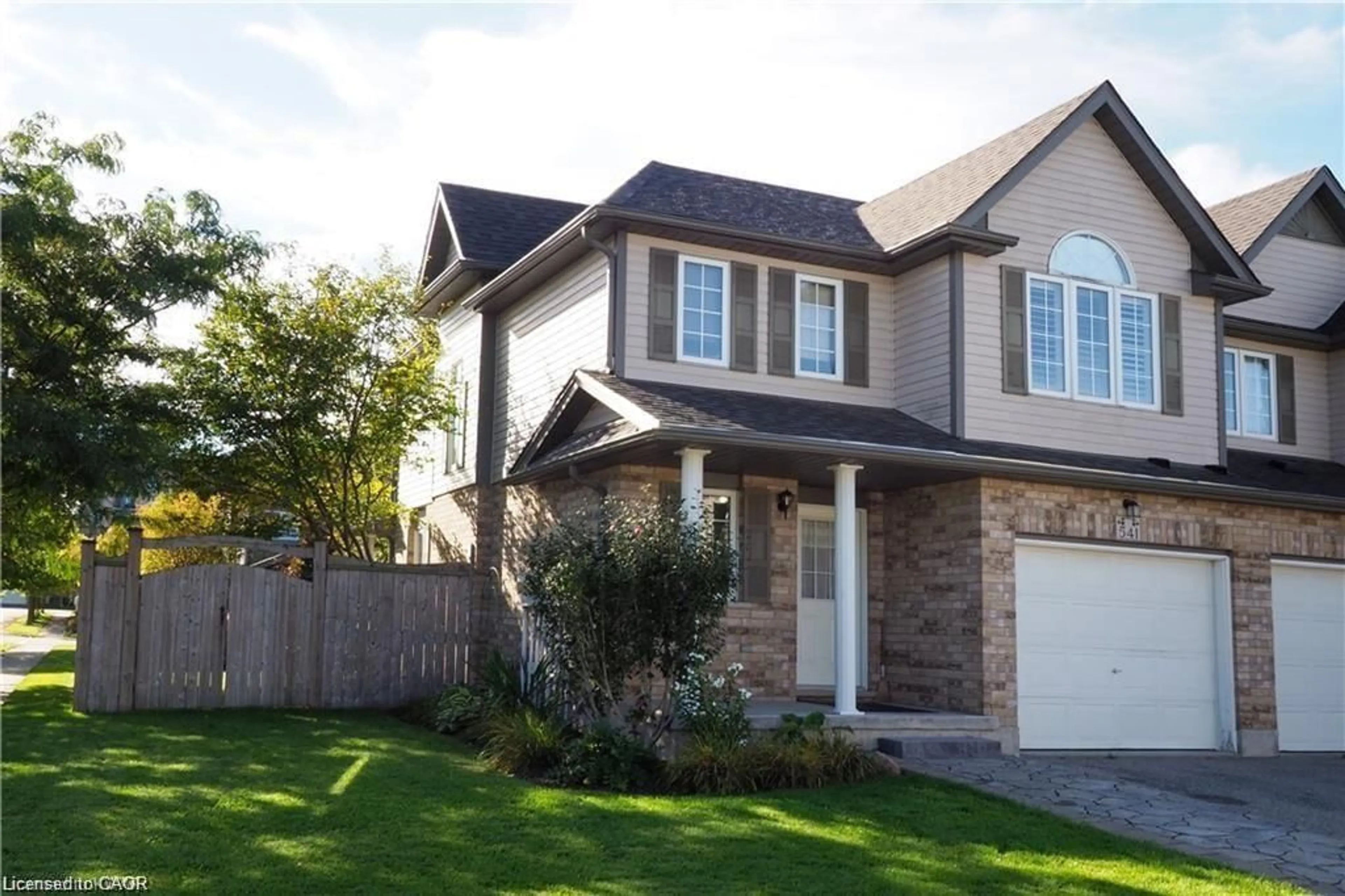 Home with brick exterior material, street for 541 Wild Iris Ave, Waterloo Ontario N2V 2W4