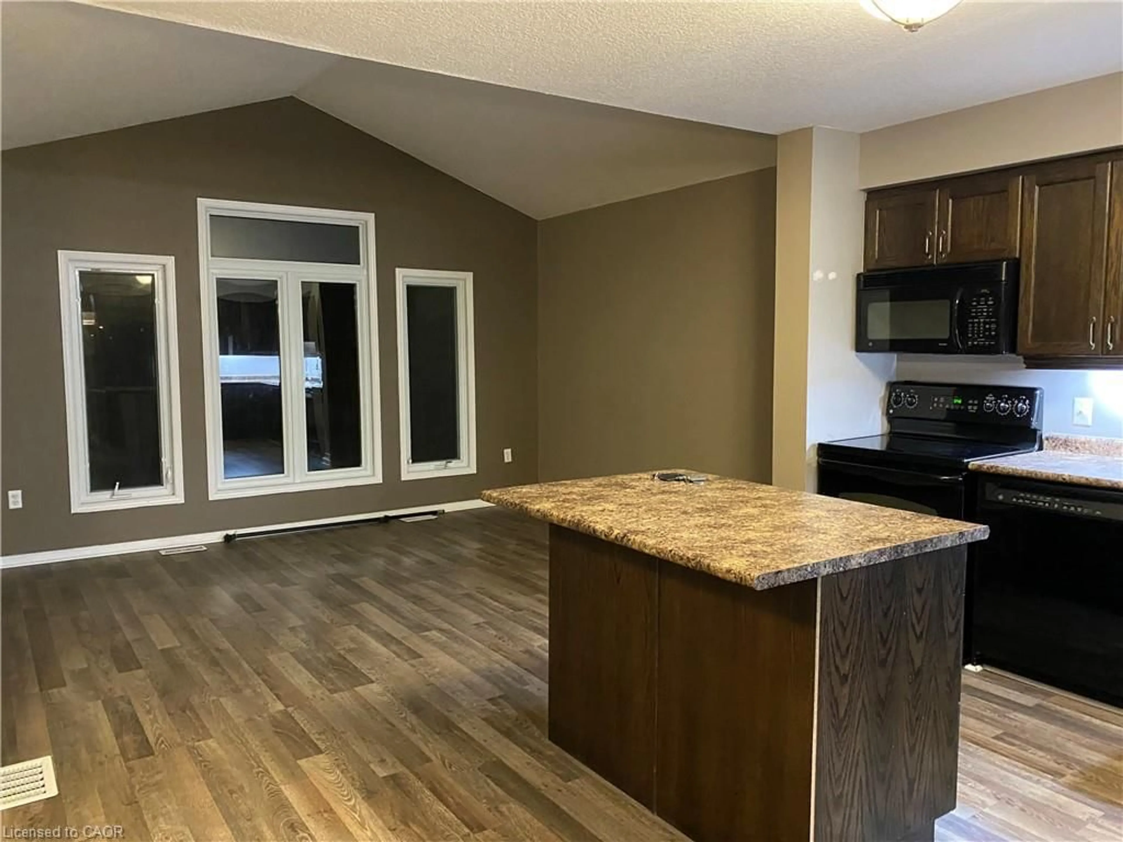 Open concept kitchen, wood/laminate floor for 541 Wild Iris Ave, Waterloo Ontario N2V 2W4