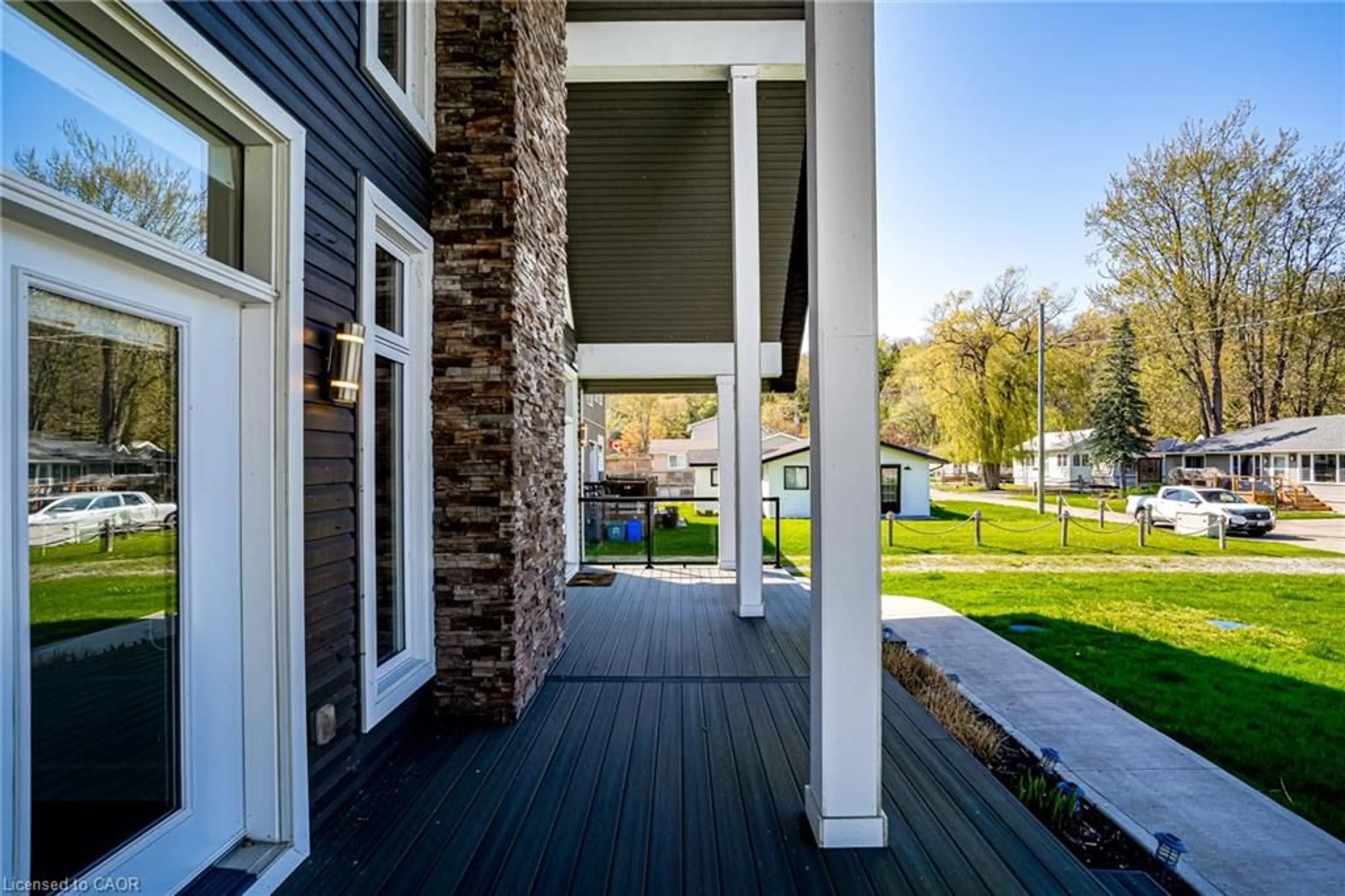 Home with vinyl exterior material, street for 18 Walter St, Turkey Point Ontario N0E 1T0
